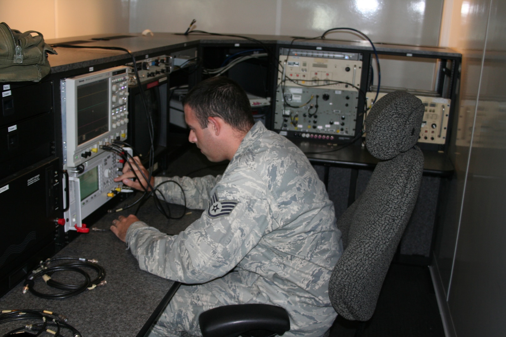 Staff Sgt. Phillip Graves, 346th Test Squadron, calibrates equipment for radio frequency emission testing here Oct. 4. (U.S. Air Force photo by Senior Airman James Barker)
