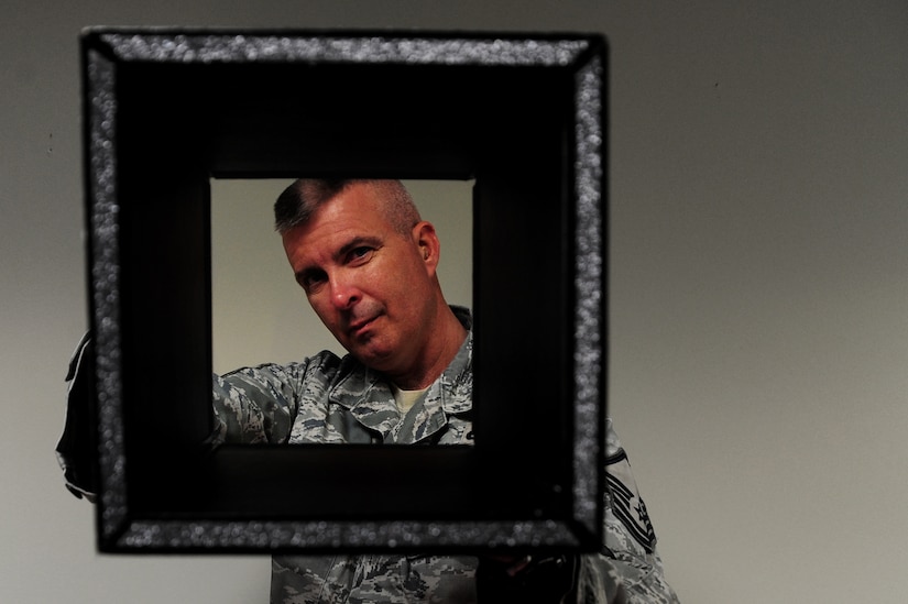 Master Sgt. Perry Woods shows that the box is empty while he demonstrates one of his magic tricks at Joint Base Charleston - Air Base Nov. 30. Woods has been in the Air Force for 22-years and has been performing magic since he was nine-years old. He has volunteered to perform his magic shows for local organizations and charities for the past three years. Woods is a program manager with the 437th Maintenance Squadron.  (U.S. Air Force photo/ Staff Sgt. Nicole Mickle)  
