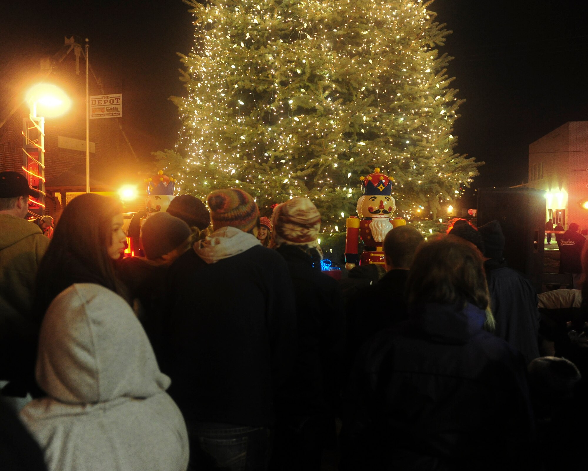 MINOT, N.D. -- A crowd of children and adults alike attended this year's Christmas Open House and Tree Lighting Ceremony here, Nov. 25. Events such as this offer an opportunity for Airmen and their families to enjoy the holidays together with the local community. (U.S. Air Force photo/Senior Airman Michael J. Veloz)

