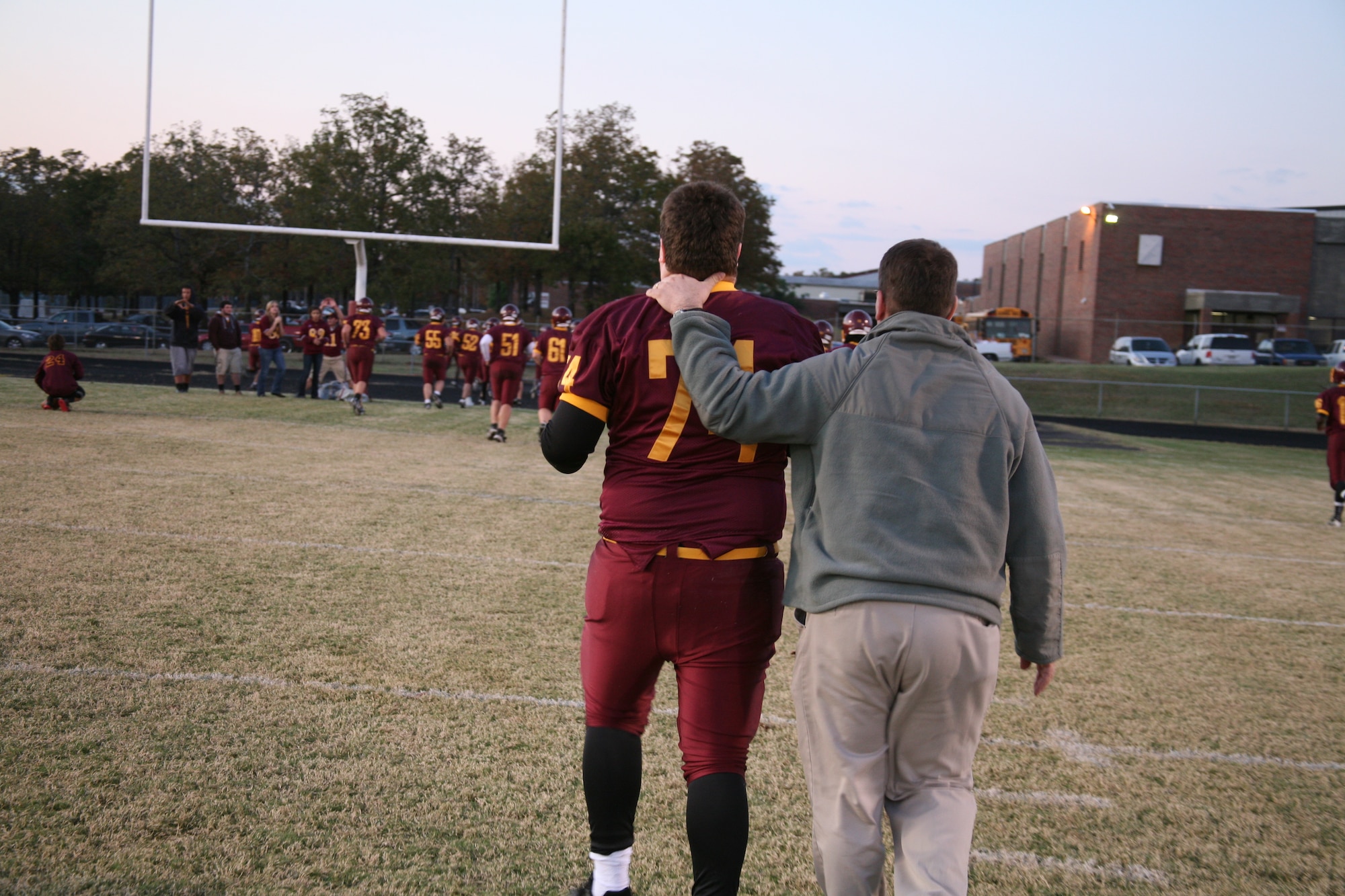 Jonathon Ruyters stretches during pre-game warmups Oct. 28.