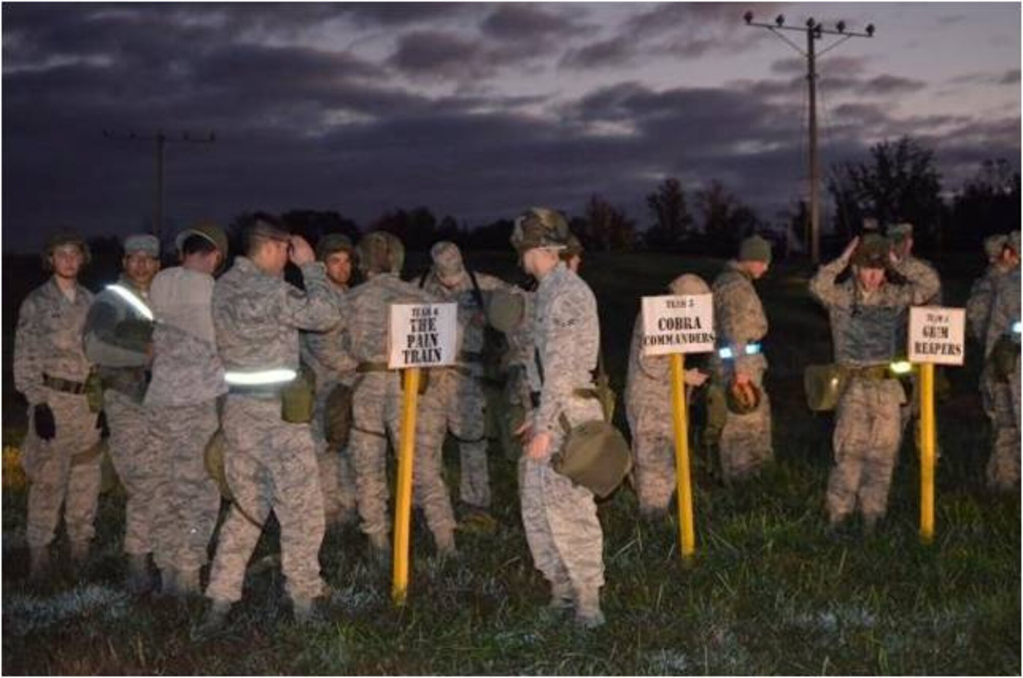 Airmen gather around the start line during the AFDW and 844th Communications Group Warrior Day, which consisted of Airmen honing basic battlefield skills while building camaraderie and cohesiveness within their teams. 