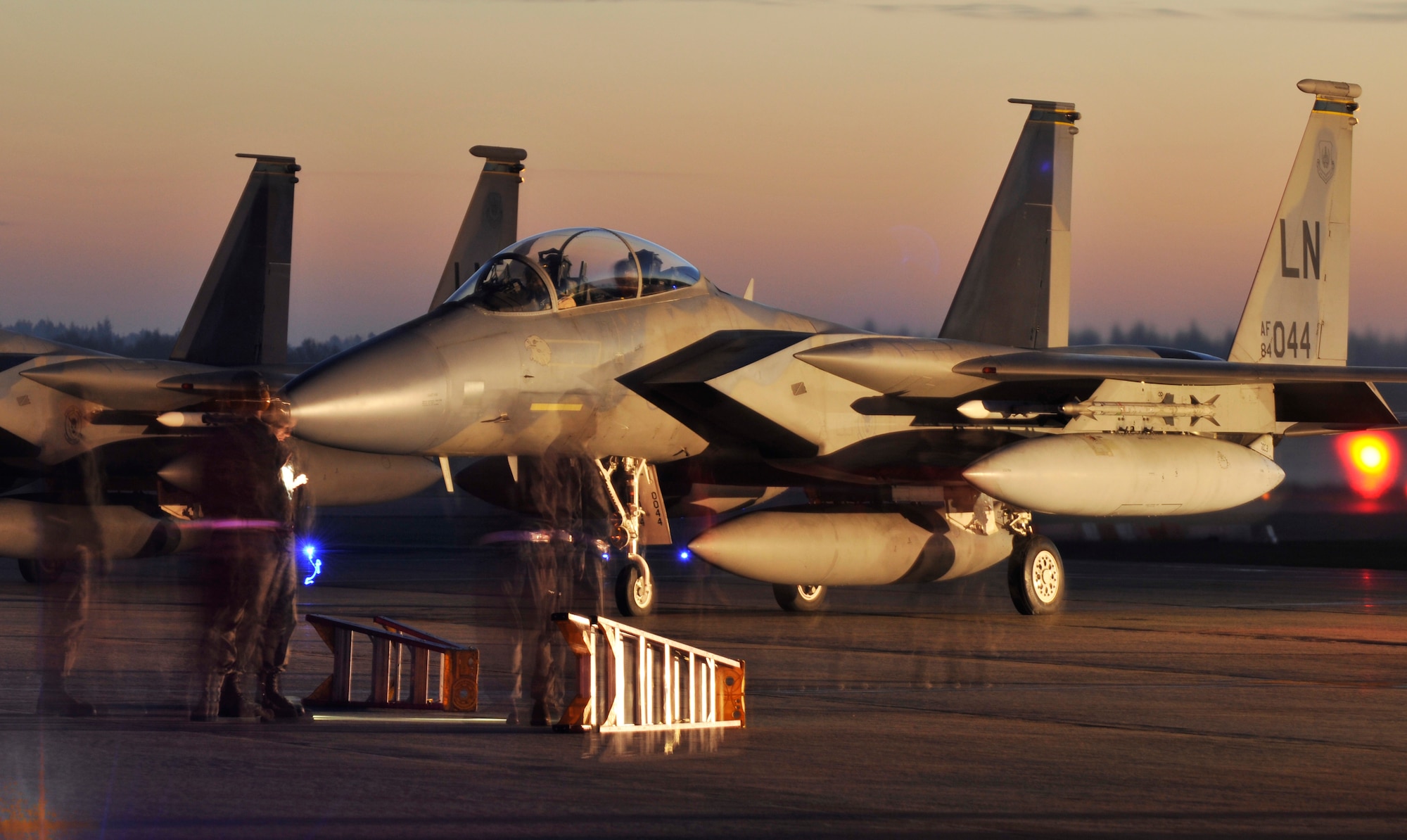 ROYAL AIR FORCE LAKENHEATH, England - Liberty Airmen make final preparations on F-15 Eagles prior to take-off, April 8, 2011. The 493rd Fighter Squadron deployed members to an undisclosed location in Southwest Asia. (U.S. Air Force photo/Senior Airman Tiffany M. Deuel)