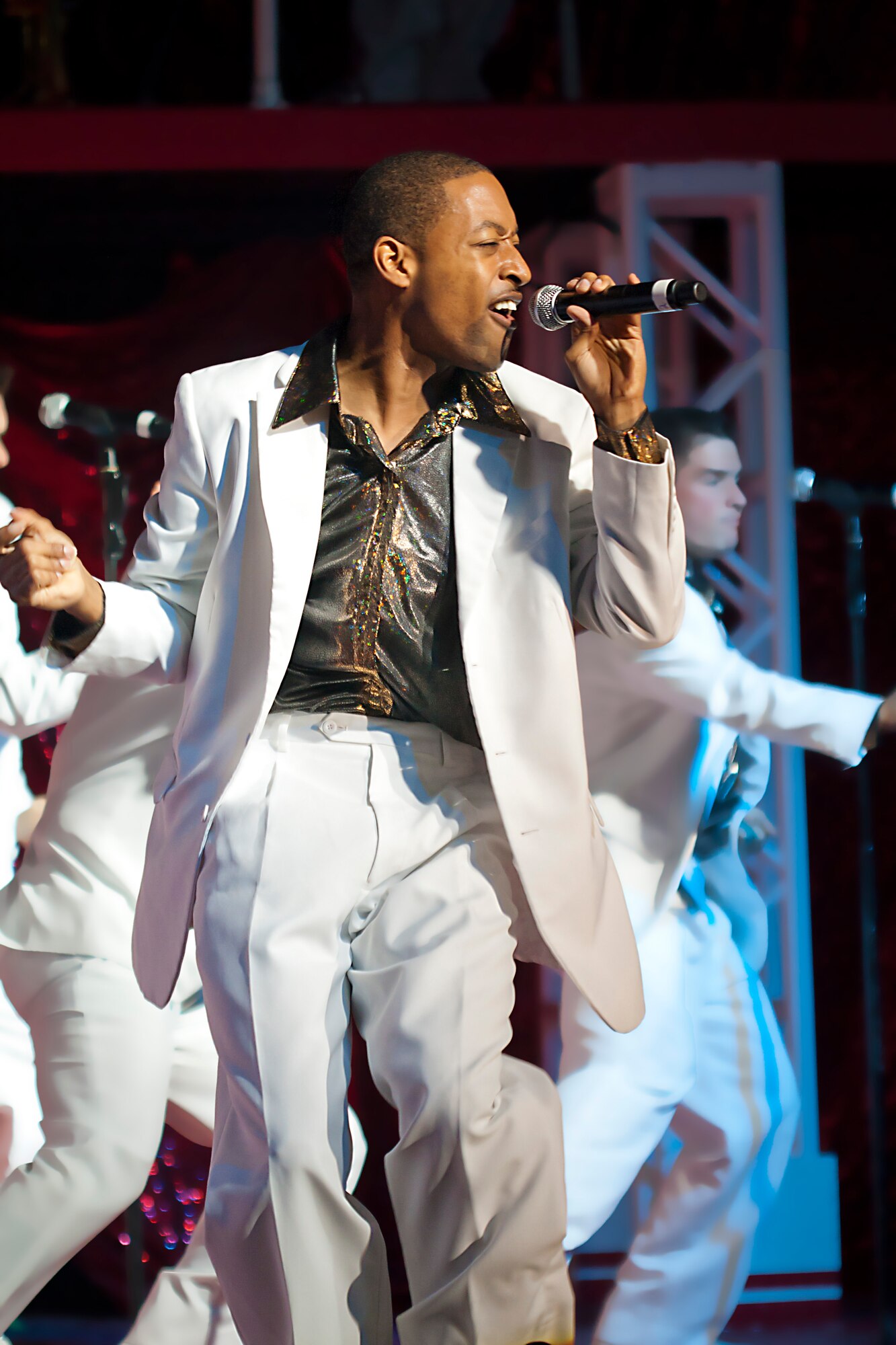 A  member of Tops in Blue performs a motown favorite during a performance at Osan Nov. 26.Composed of 35 to 40 of the most talented vocalists, musicians, dancers, and techncians anywhere, their primary purpose is to perform for military personnel and their families throughout the world.
