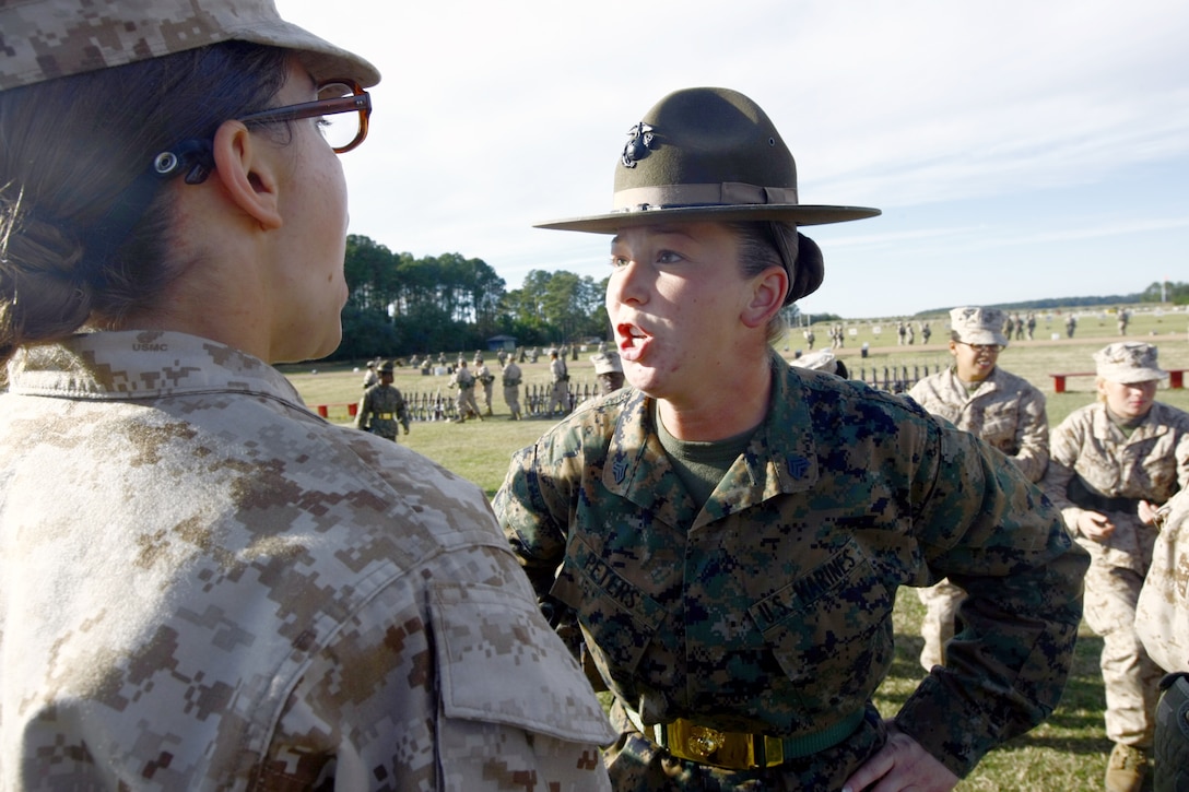 Sgt. Mark Peters, drill instructor, Company K, 3rd Recruit Training Battalion and his younger sister, Sgt. Amanda Peters, drill instructor, Company N, 4th Recruit Training Battalion, Parris Island, S.C. spend endless hours training recruits in hopes to meet their goal.::r::::n::::r::::n::