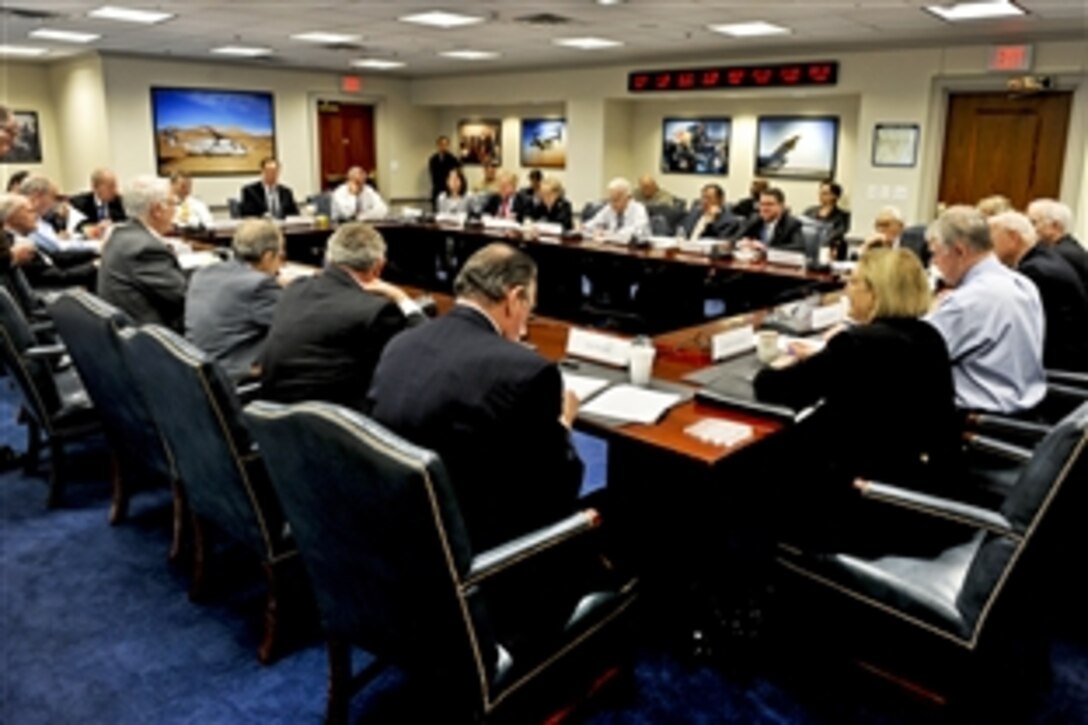 Defense Secretary Leon E. Panetta, center right, and Deputy Defense Secretary Ashton B. Carter listen as John Hamre, Defense Policy Board chairman, center left, discusses the board's issues and conclusions during its annual meeting at the Pentagon, Nov. 30, 2011. The board was established to provide the defense secretary and senior staff an independent source of expert analysis, recommendations and opinions on security issues.