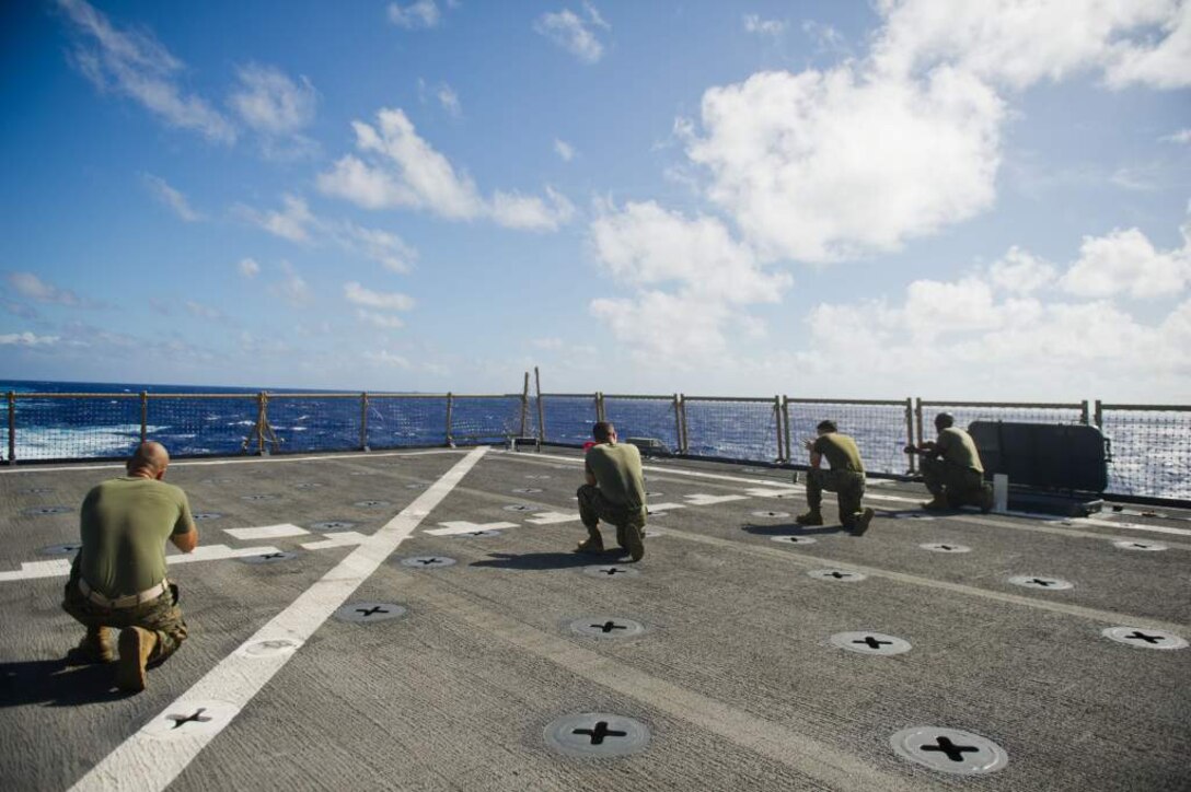 Marines with Company K, Battalion Landing Team 3/1, practice patrolling techniques aboard USS Pearl Harbor here Nov. 30. The team is the ground combat element for the 11th Marine Expeditionary Unit, which embarked USS Makin Island, USS New Orleans and USS Pearl Harbor in San Diego Nov. 14, beginning a seven-month deployment to the Western Pacific and Middle East regions.