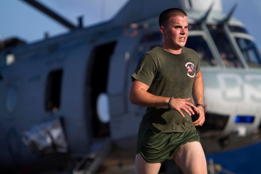 Lance Cpl. Alex P. Jones runs aboard the amphibious transport dock New Orleans for exercise here Nov. 30. Jones is a 21-year-old rifleman with Headquarters and Service Company. The company is a part of Battalion Landing Team 3/1, the ground combat element for the 11th Marine Expeditionary Unit, which embarked USS Makin Island, USS New Orleans and USS Pearl Harbor in San Diego Nov. 14, beginning a seven-month deployment to the Western Pacific and Middle East regions.