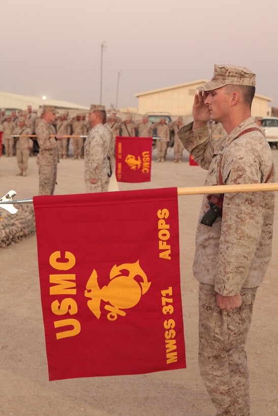 Marines with Marine Wing Support Squadron 371 salute during a ceremony at Camp Leatherneck, Afghanistan, Oct. 1. Marine Wing Support Squadron 272,relinquished command to Marine Wing Support Squadron 371, and is deploying back to Marine Corps Air Station New River, N.C. “It’s been a highly productive deployment,” said Lt. Col. Dale Kruse, the Marine Wing Support Squadron 272 commanding officer and a native of Morenci, Mich. “Not only have the Marines executed duties of aviation ground support functions, they’ve also been part of several large-scale building operations for vertical and horizontal construction.”