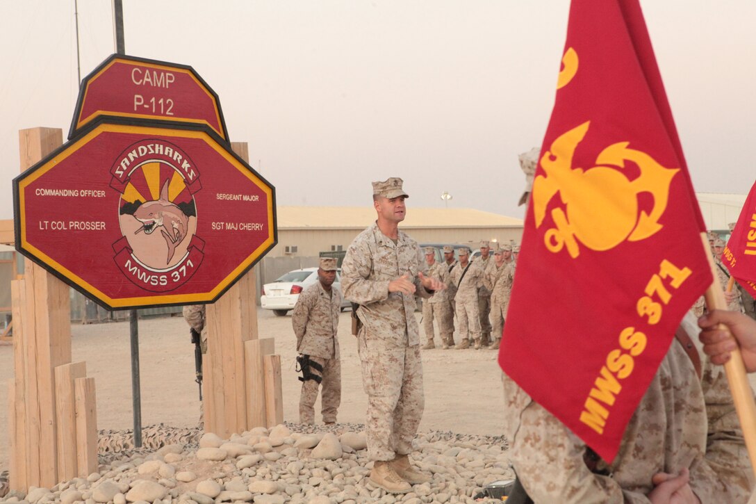 Lt. Col. Michael Prosser, Marine Wing Support Squadron 371’s commanding officer, and a native of  Golden, Colo. addresses his Marines after assuming control of aviation support operations for 2nd Marine Aircraft Wing (Forward) during a ceremony at Camp Leatherneck, Afghanistan, Oct. 1.