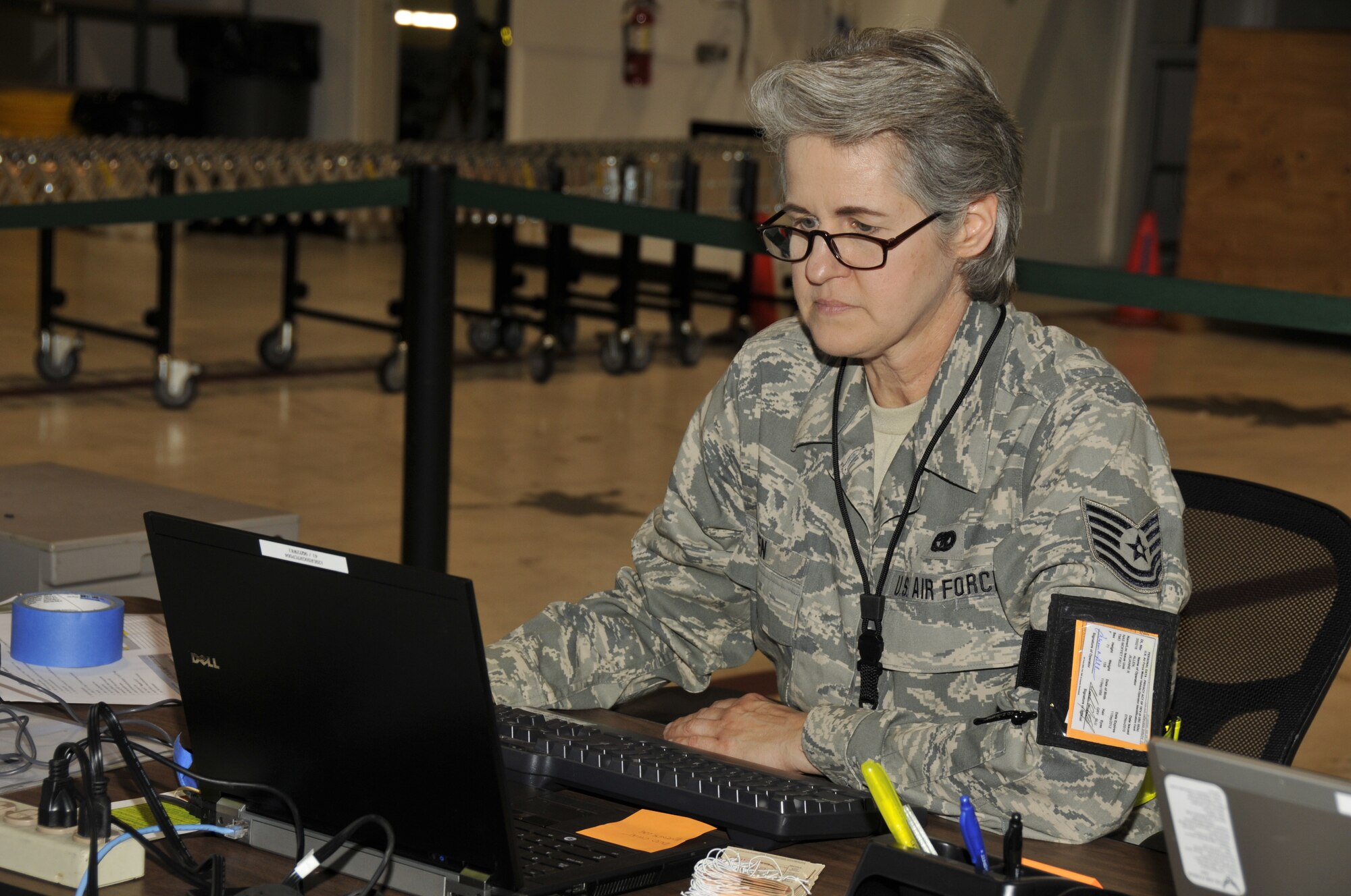 California Air National Guard Tech. Sgt. Jilianne Allen, NCO in charge of passenger services, 129th Logistics Readiness Squadron, monitors the
Defense Connect chat room during the 129th Rescue Wing's Phase I Operational
Readiness Exercise at Moffett Federal Airfield, Calif., Oct., 1, 2011. (Air
National Guard photo by Staff Sgt. Kim E. Ramirez/Released)

