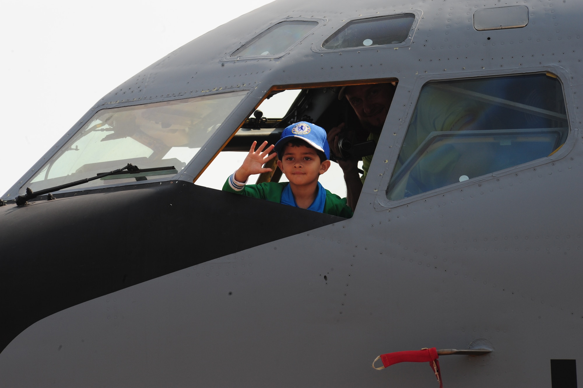 PRETORIA, South Africa - A young South African child sits aboard a KC-135 during the 2011 Air Show and Lifestyle Expo at Waterkloof Air Force Base, Oct. 1. South Africans had an opportunity to climb aboard and sit in the cockpit of the KC-135 during their visit to this year's air show. (U.S. Air Force photo by Tech. Sgt. Todd Wivell)