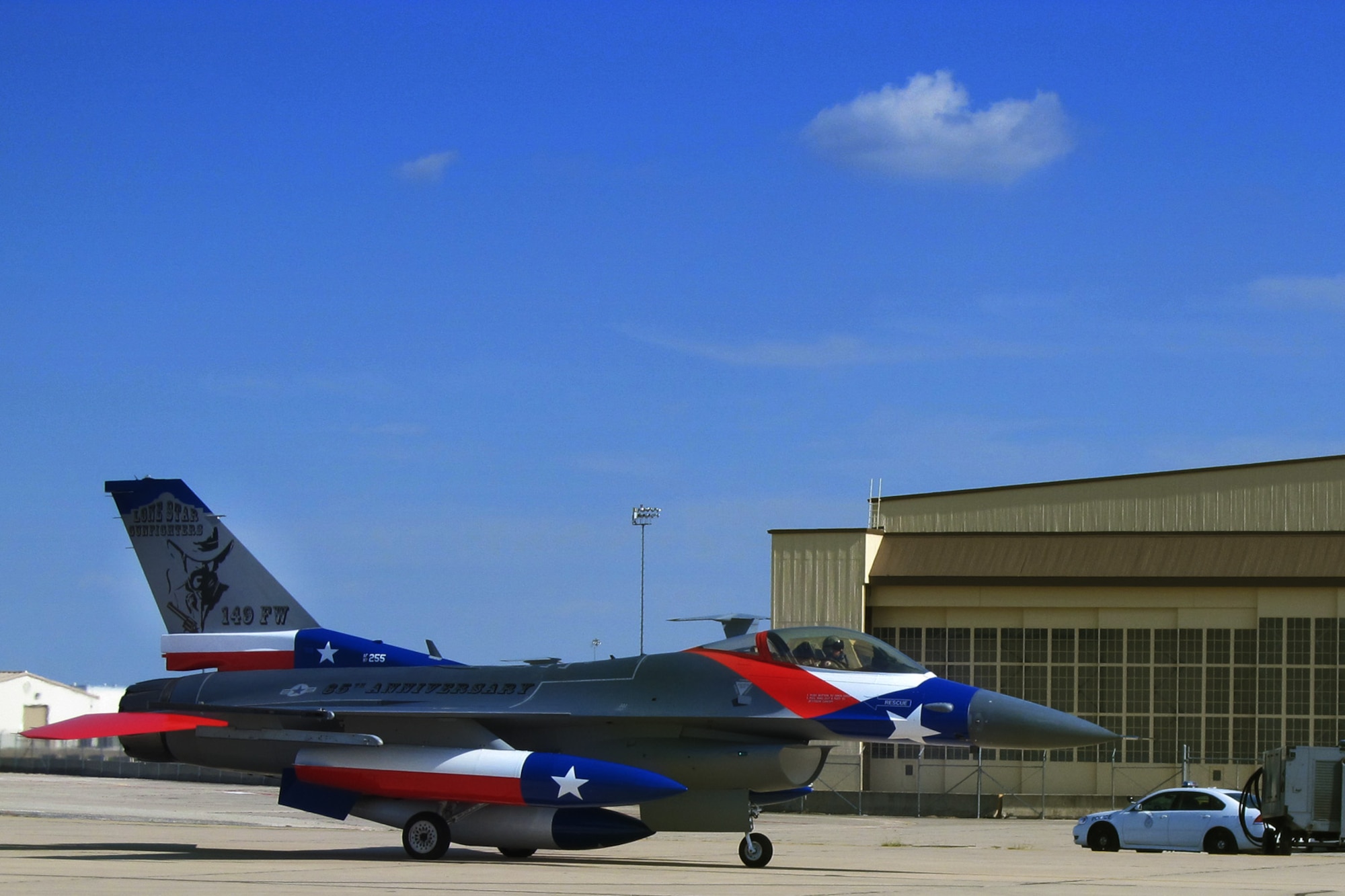 The Texas Air National Guard's 149th Fighter Wing's flagship F-16 returning to Lackland Air Force Base after being painted to honor the 65th anniversary of the unit's affiliation with the Air National Guard, Sept. 29, 2011. (Air National Guard photo by Staff Sgt. Phil Fountain/Released)