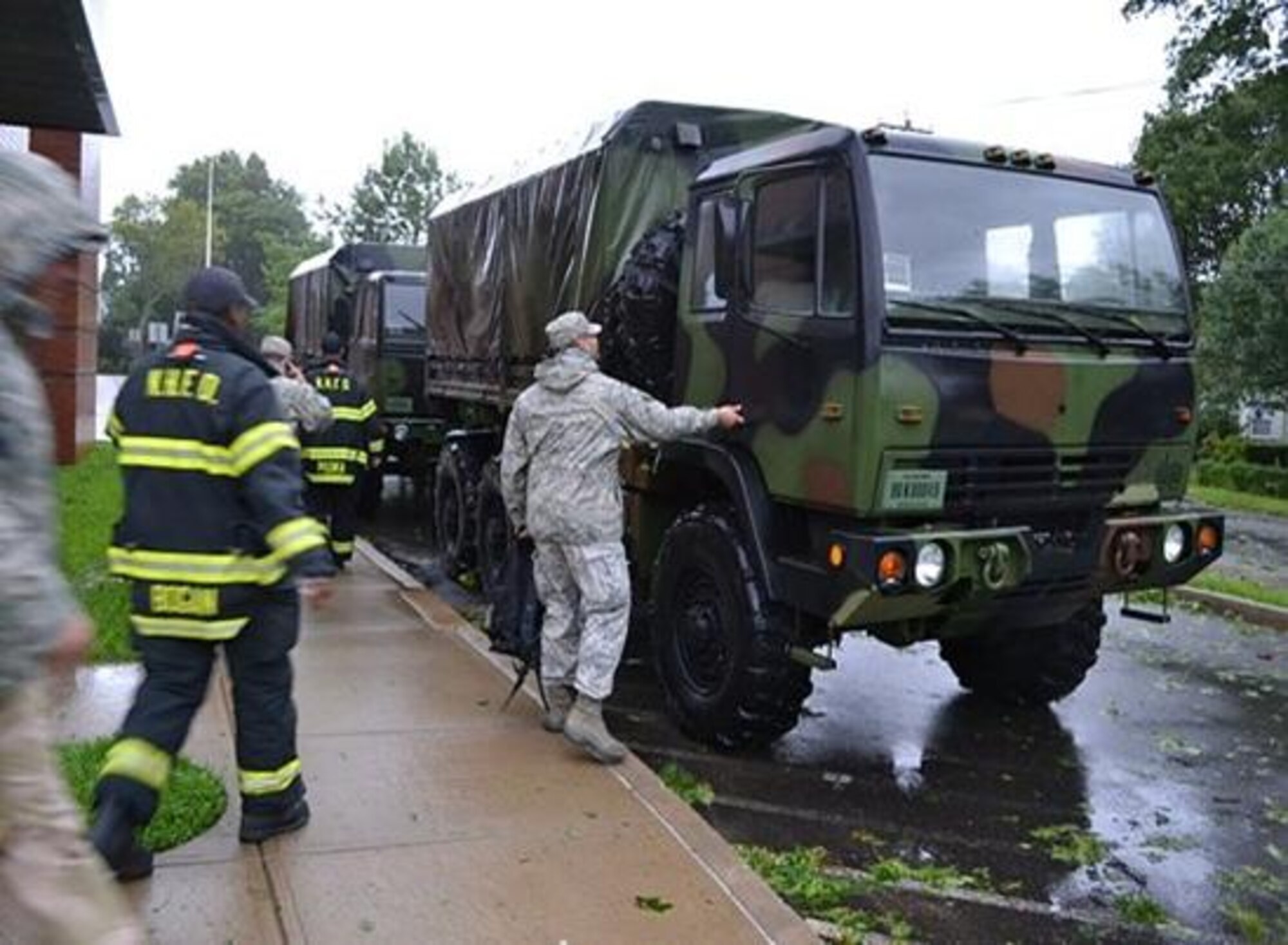 Air National Guard support to the joint response to Hurricane Irene was in full motion Saturday, Aug. 27, 2011, as several Soldiers and Airmen rolled out in multiple cities to support civilian authorities. (Photo courtesy of 103rd ACS UPAR)