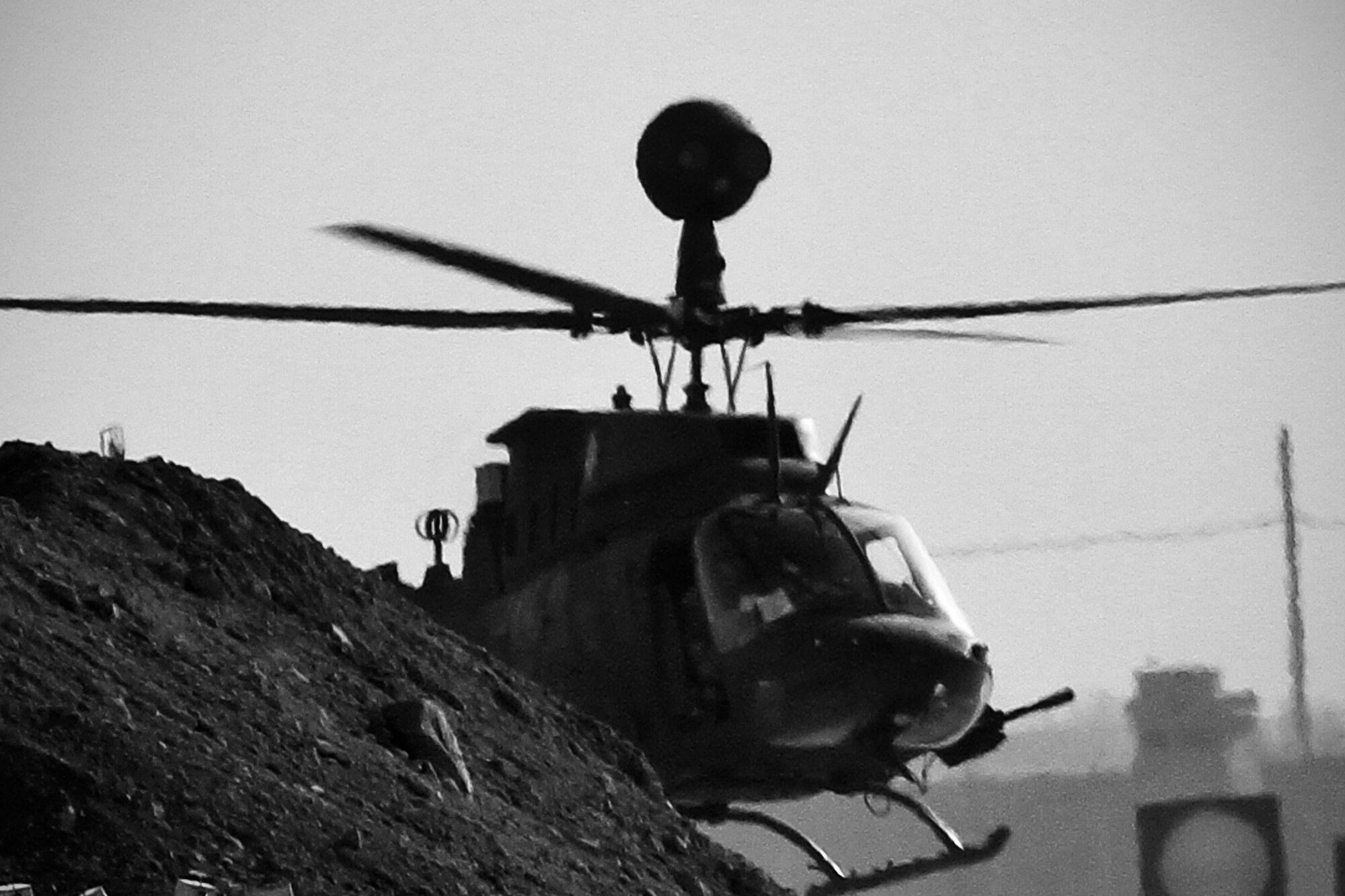 BAGRAM AIRFIELD, Afghanistan -- An Army Bell OH-58 Kiowa Warrior from Task Force Falcon prepares to depart here Sept. 30, 2011. The Kiowa is an advanced scout helicopter that has been in the U.S. inventory since 1969. Air Force aircraft and ground personnel often work hand-in-hand with Army aircraft to achieve mission objectives in Afghanistan. (U.S. Air Force photo/Tech Sgt. Matt Hecht)