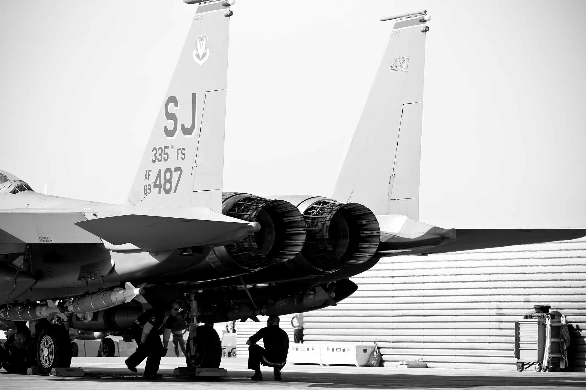 BAGRAM AIRFIELD, Afghanistan -- Airmen from the 455th Expeditionary Aircraft Maintenance Squadron, perform maintenance on an F-15E Strike Eagle here Sept. 30, 2011. The F-15 is a dual-role fighter designed to perform air-to-air and air-to-ground missions. It can penetrate enemy defense and outperform and outfight any current enemy aircraft. (U.S. Air Force photo/Tech Sgt. Matt Hecht)