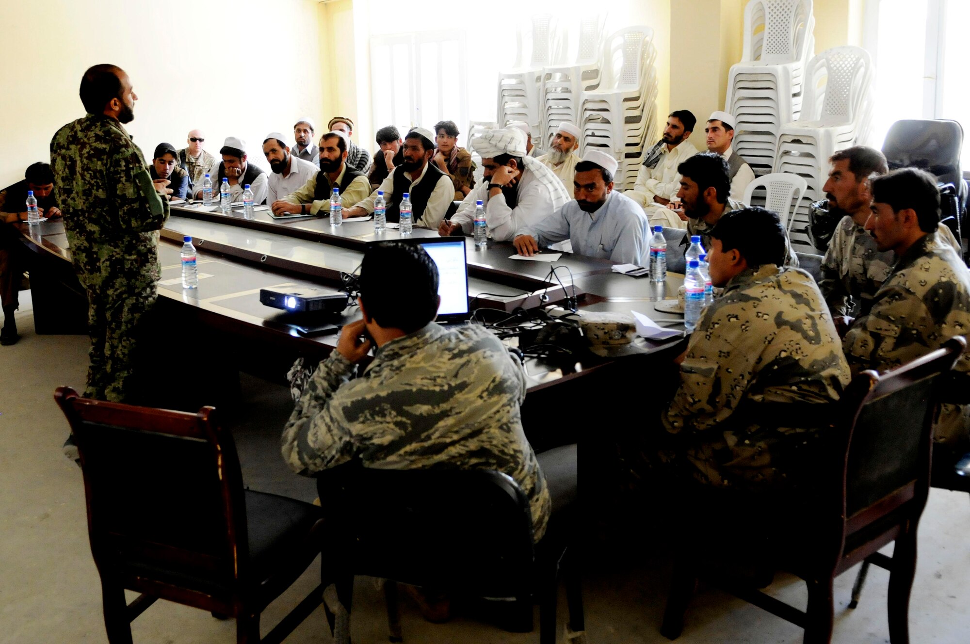 Medical providers from the Jaji district hospital, Paktya province, Afghanistan, receive a lecture covering hygiene procedures during a medical training seminar, Paktya Province, Afghanistan, Sept. 25, 2011. More than 20 providers attended the training hosted by the Afghan National Army and coalition forces, creating a sustainable healthcare system for the citizens of Jaji. (U.S. Air Force photo/Senior Airman Wesley Farnsworth)