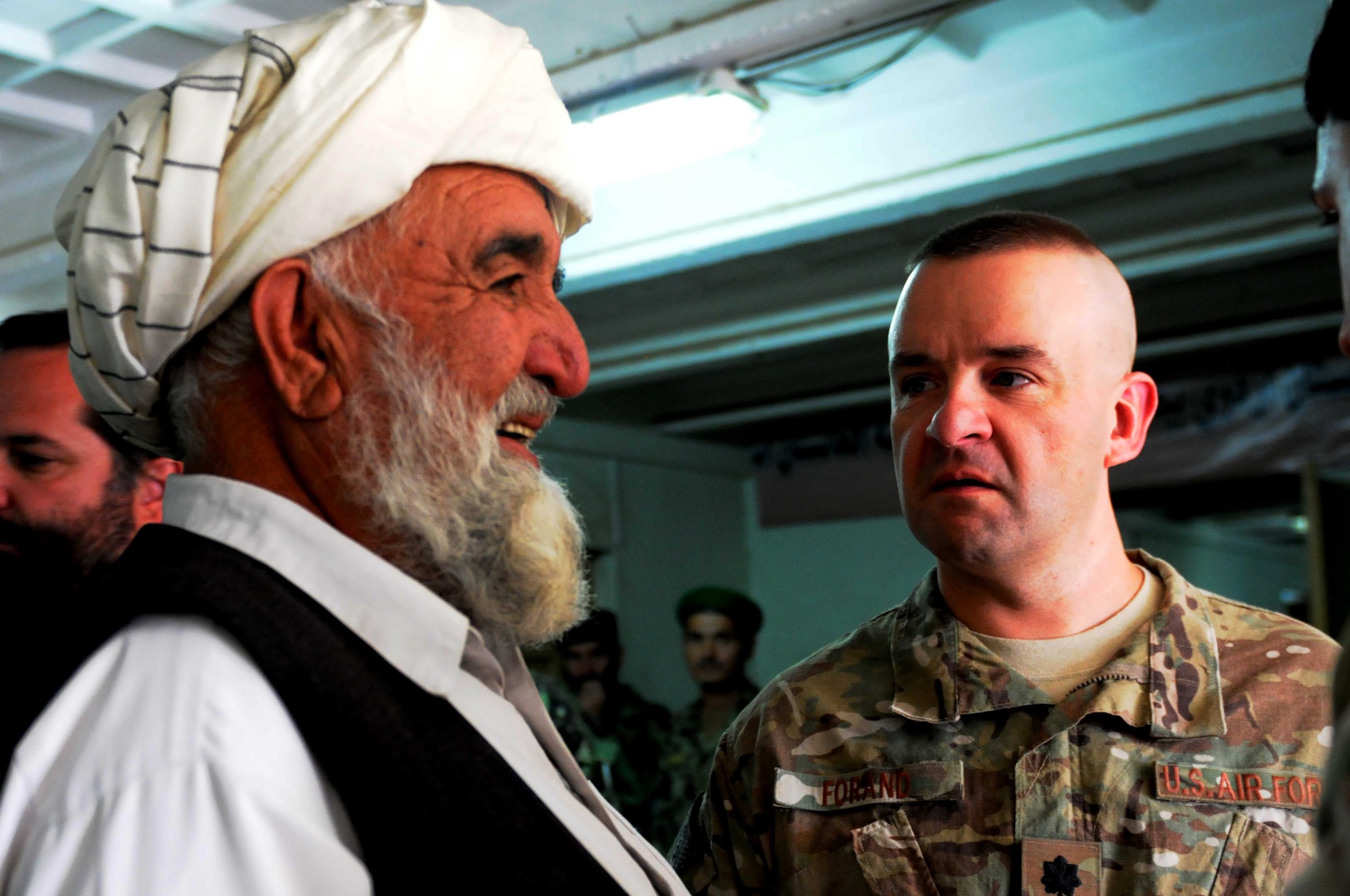 Lt. Col. James Forand, Provincial Reconstruction Team Paktya commander from Auburn Mass., speaks with a Zormat elder during a government outreach mission in Paktya Province, Afghanistan, Sept 26, 2011. The PRT partners with the Afghan Government to facilitate a secure and sustainable Afghanistan. (U.S. Air Force photo/ 1 Lt Cammie Quinn)