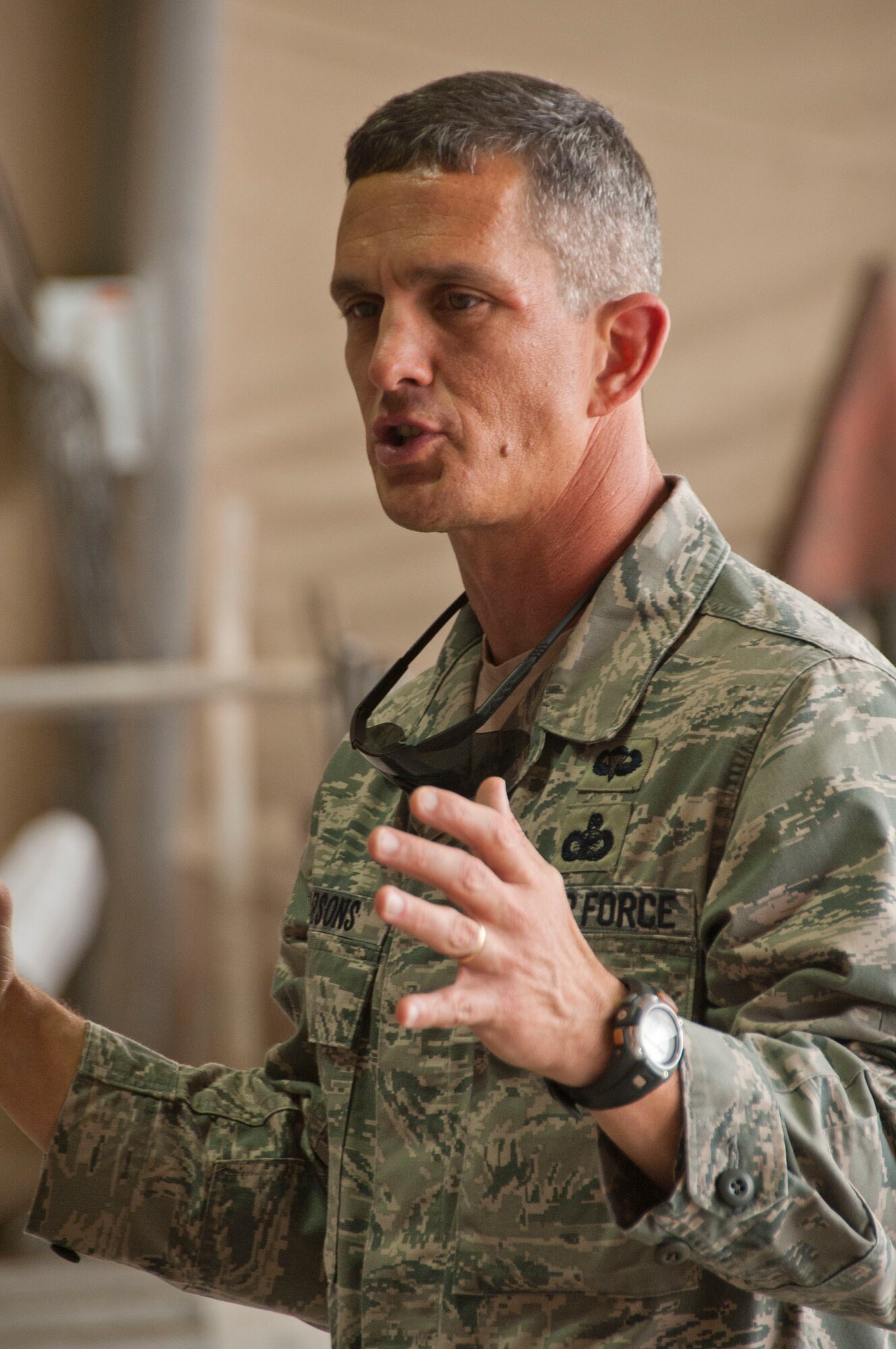 Chief Master Sgt. Richard Parsons, AFCENT command chief, speaks to deployed Airmen at Kandahar Airfield, Afghanistan, Sept. 24, 2011. The Airmen are assigned to the 74th Expeditionary Aircraft Maintenance Squadron and the 74th Expeditionary Maintenance Squadron. (U.S. Air Force photo by Senior Airman Corey Hook)