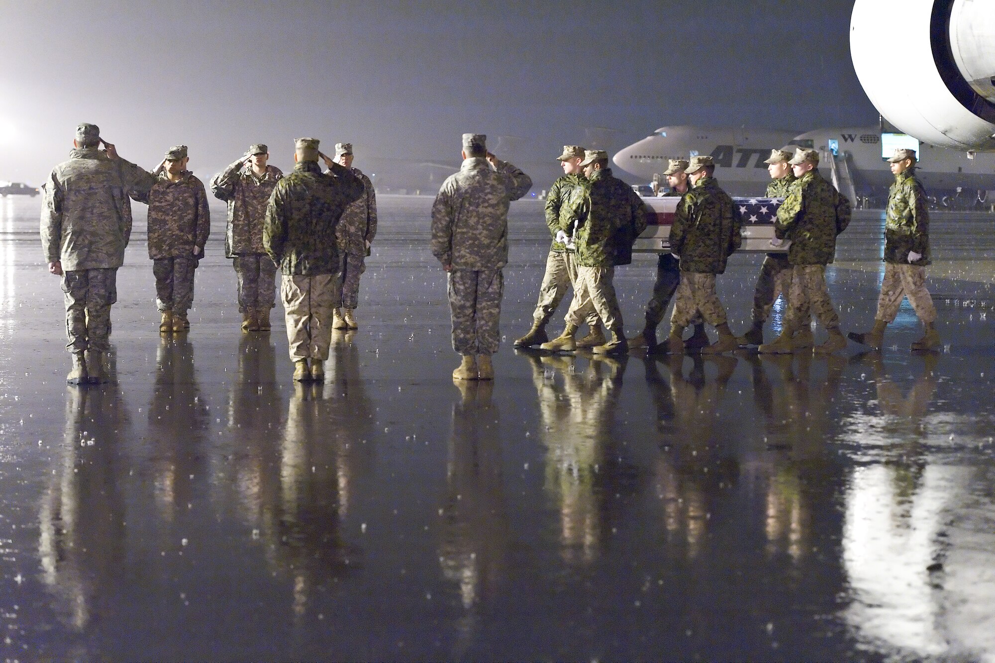 A U.S. Marine Corps carry team transfers the remains of Marine Lance Cpl. John R. Wimpey Cagle, of Tucker, Ga., at Dover Air Force Base, Del., Sept. 30, 2011. Cagle was assigned to 2nd Light Armored Reconnaissance Battalion, 2nd Marine Division, II Marine Expeditionary Force, Camp Lejeune, N.C. (U.S. Air Force photo/Roland Balik)