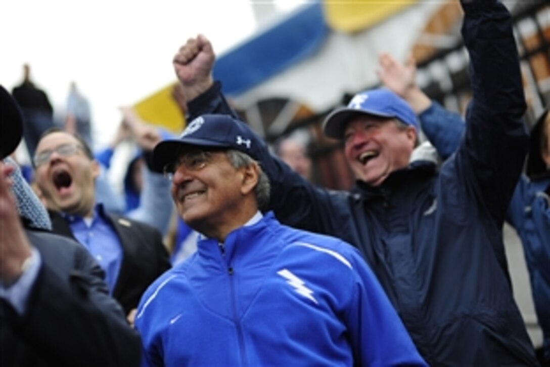 Defense Secretary Leon E. Panetta sits within the Air Force fan section during the Air Force vs. Navy football game at the Navy-Marine Corps Memorial Stadium in Annapolis, Md., Oct. 1, 2011.