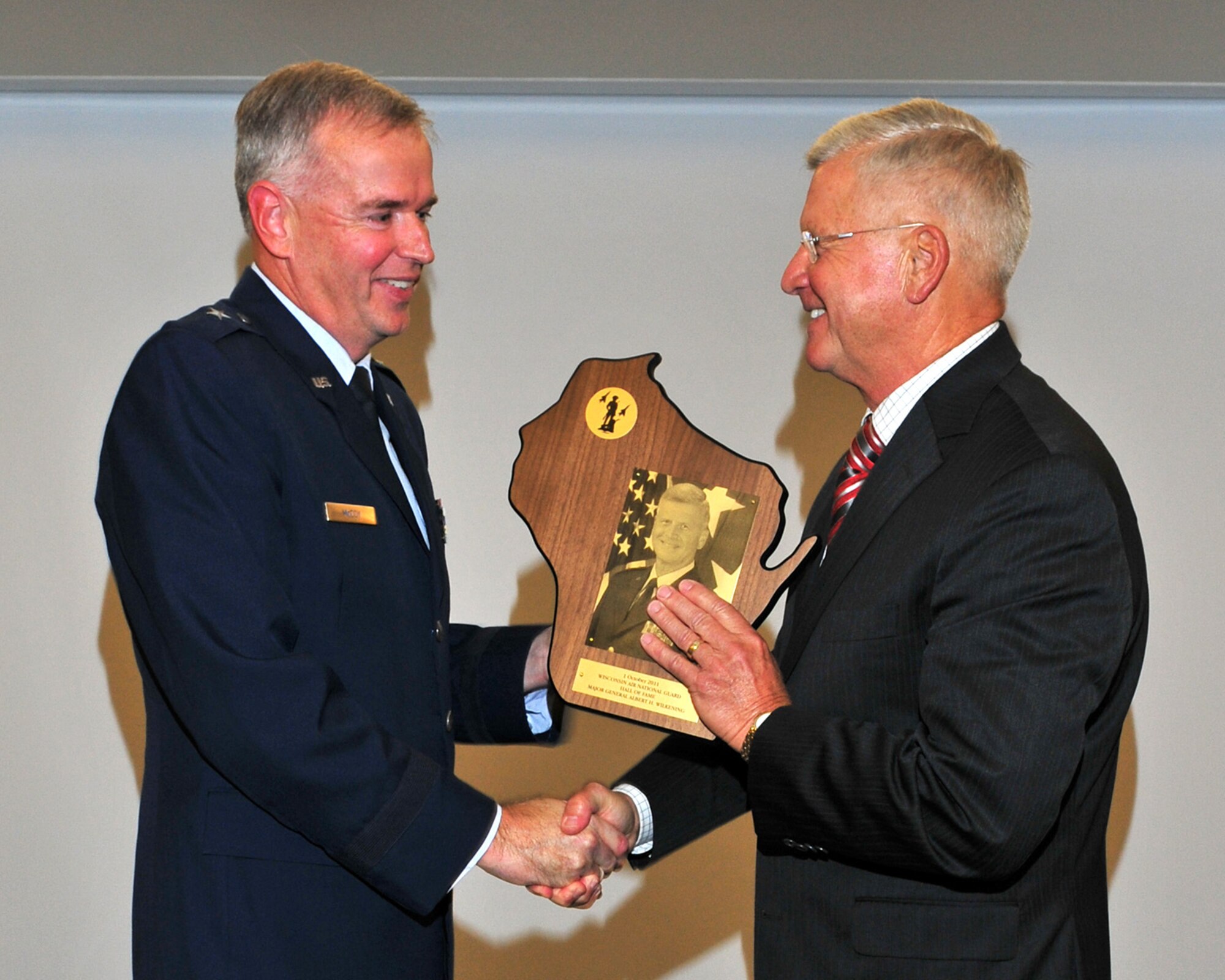 Retired Major Generals Albert H. Wilkening and Fred R. Sloan became the latest members of the Wisconsin Air National Guard Hall of Fame during an induction ceremony at Truax Field, ANGB on Saturday October 1st, 2011. The Wisconsin Air National Guard Hall of Fame was established on June 15th 1982 to honor the special contributions Air National Guard members make to the overall success of the Wisconsin National Guard mission. (USAF photo by MSgt Paul Gorman)    