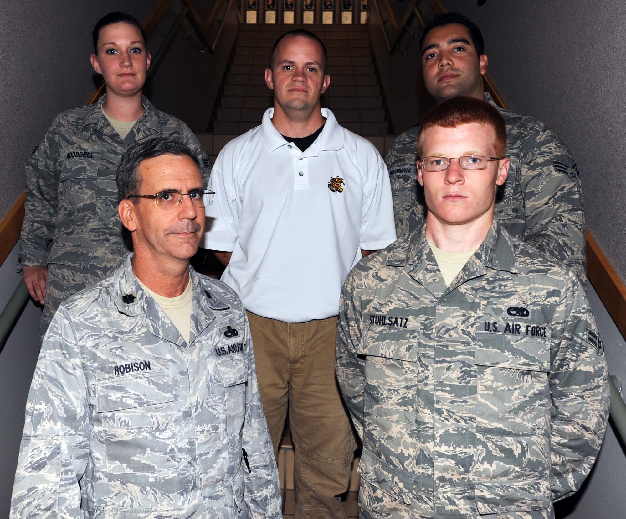 The 931st Air Refueling Group welcomed five new members during the October UTA.  Pictured are, back row, Senior Airman Elizabeth Aduddell, Senior Airman Shane McCallie, and Senior Airman Carlos Morales.  Front row are Lt. Col. Donald Robison and Airman 1st Class Isaac Stuhlsatz.  (U.S. Air Force photo by 1st Lt. Zach Anderson) 