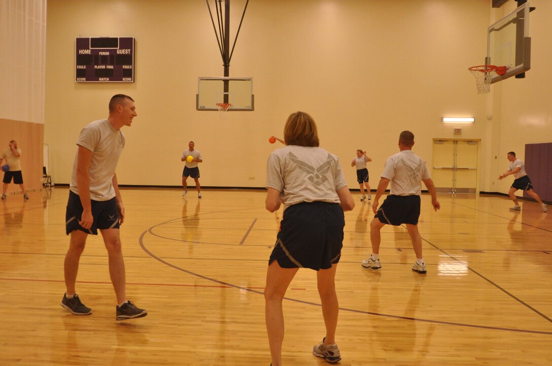 934th Airlift Wing Financial Managment members get in a game of dodgeball at the fitness center. Besides team building, mebers get in some good physical activity. Minneapolis ARS MN. (Air Force Photo/TSgt Bob Sommer)