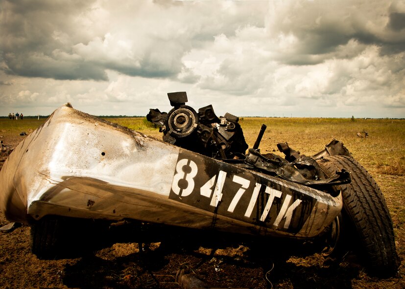 The front half of a pick-up truck was all that remained after 150 pounds of explosives were detonated inside it Sept. 27 on Eglin Air Force Base's range. The detonation created a crime scene for the FBI's large vehicle post blast school. State and county law enforcement, along with Navy and Air Force explosive ordnance disposal technicians, learned the proper procedures to investigate and maintain a large scale vehicle explosion. The week-long course was the second held on Eglin with 67 students representing 18 different U.S. agencies. (U.S. Air Force photo/Samuel King Jr.)