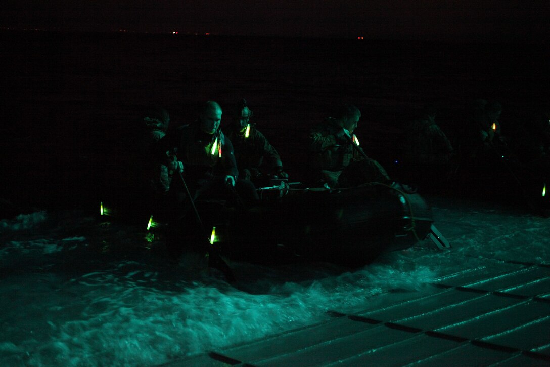 Reconnaissance Marines with the 11 the Marine Expeditionary Unit leave USS Makin Island for a nighttime exercise here Oct. 2. The unit embarked the amphibious assault ship Makin Island, the amphibious transport dock New Orleans and the dock landing ship Pearl Harbor in San Diego Sept. 28. The unit is participating in its final exercise before deploying in November.