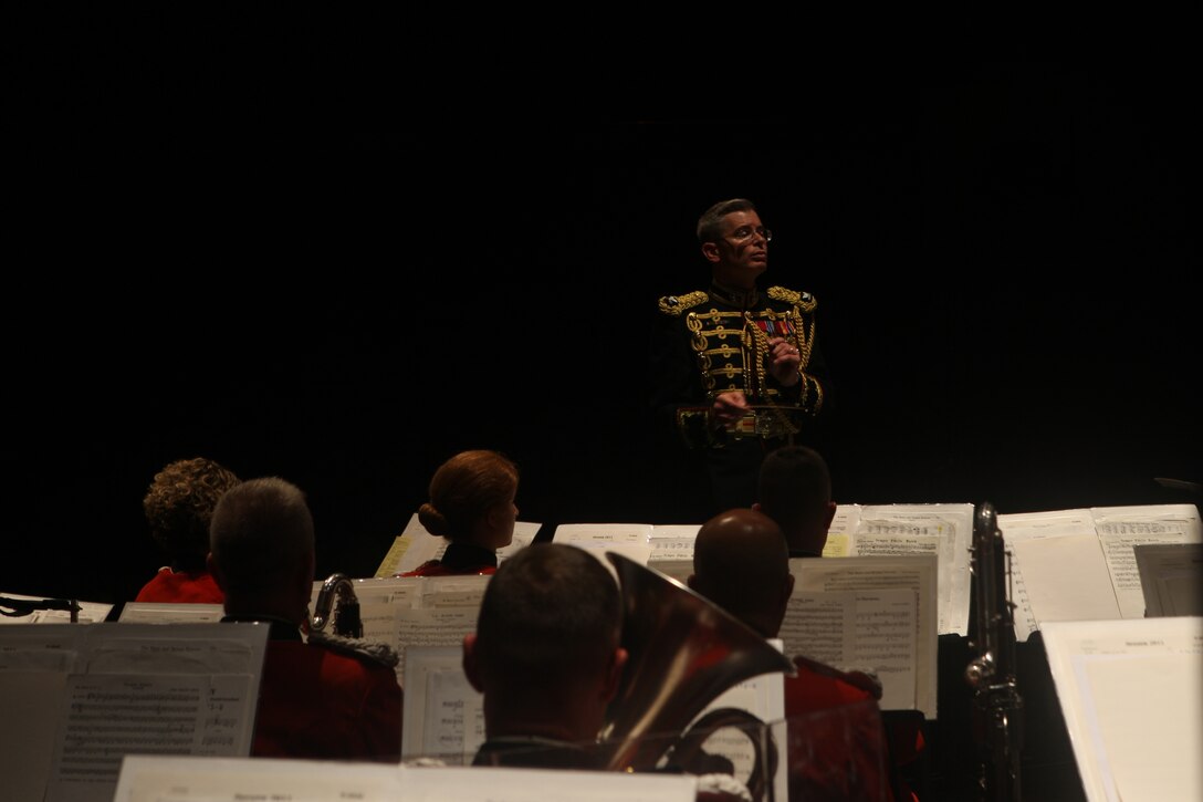 Col. Michael Colburn, director of the United States Marine Band, "The President's Own," conducts the notes of Adam Gorb's "Adrenaline City Overture" during the band's performance at the Eastern Carolina University in Greenville, N.C., Oct. 2.