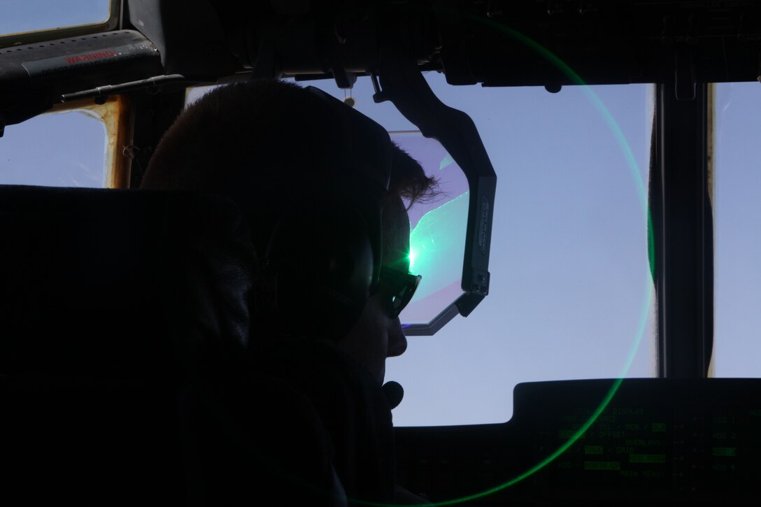 Maj. Walter J. Butler pilots a Marine Corps KC-130J Hercules during a mission in Afghanistan, Oct. 3. Butler heads the detachment of Marine Corps KC-130Js for the 2nd Marine Aircraft Wing (Forward), which provides the aviation capability for the southwestern regional command of NATO’s International Security Assistance Force.