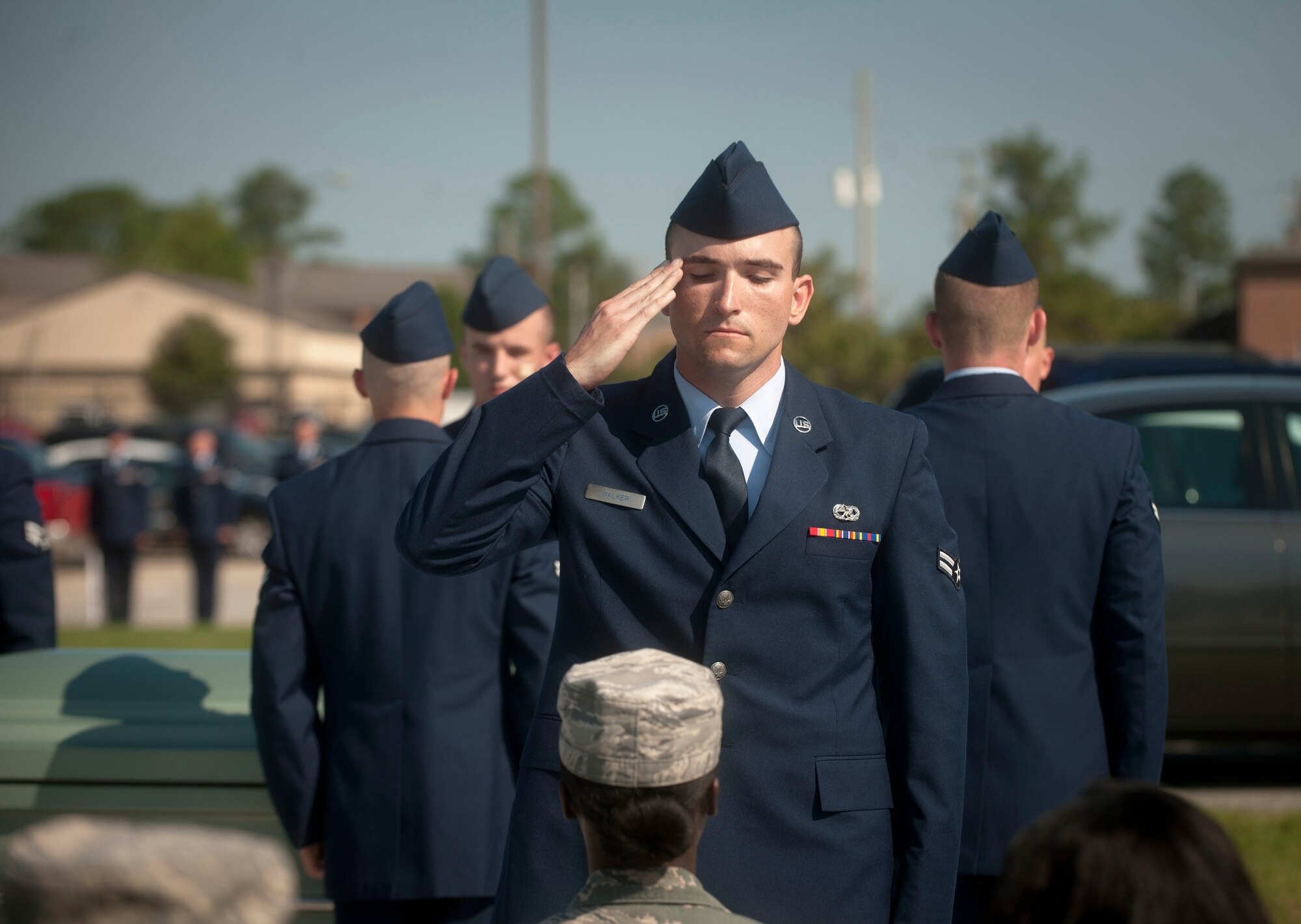 U.S. Air Force Airman 1st Class Richard Walker, Moody Air Force Base Honor Guard member, renders a salute to a member of the audience during a military honors demonstration at Moody AFB, Ga., Sept. 30, 2011. Delivering the flag and rendering a salute to the family of a fallen member is a sign of high respect for the fallen member’s service to their country. (U.S. Air Force photo by Airman 1st Class Joshua Green/Released)
