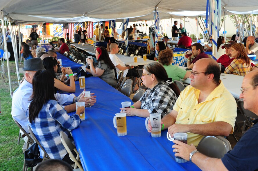 Members of Team Barksdale enjoy music during Oktoberfest on Barksdale Air Force Base, La., Sept. 30. The annual event, attended by more than 1,000 people, had German music and food, and several booths set-up for entertainment. (U.S. Air Force photo/Airman 1st Class Benjamin Gonsier)(RELEASED)