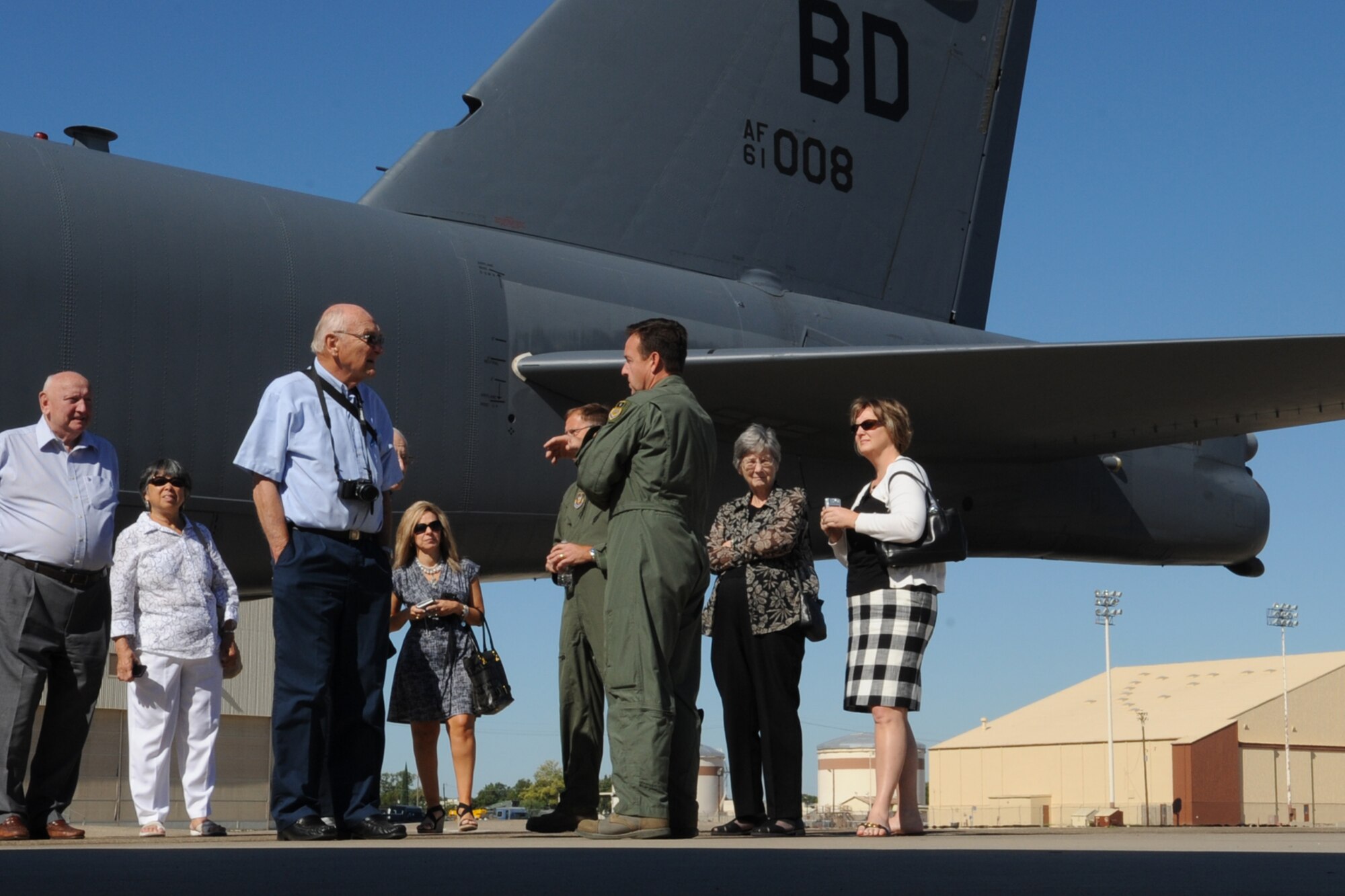 U.S. Air Force Lt. Col Todd Callahan, 11th Bomb Squadron director of training, talks to retired members and family of the Alaskan Singing Sergeants about the B-52 Stratofortress and its mission at Barksdale Air Force Base, Oct. 2, 2011. The Alaskan Singing Sergeants were formed at Elmendorf Air Force Base, Alaska, in 1951, and toured Japan and Korea, singing for the troops stationed there. (U.S. Air Force photo by Master Sgt. Greg Steele/Released)