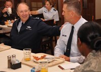 Lt. Gen. Charles Stenner, AFRC commander, talks with 916th Air Refueling Wing Command Chief Master Sgt. Greg Nelson. Stenner had breakfast with nearly a dozen Airmen from the 916th ARW on Oct. 3, 2011. (USAF photo by SrA Meredith Thomas, 916ARW/PA)