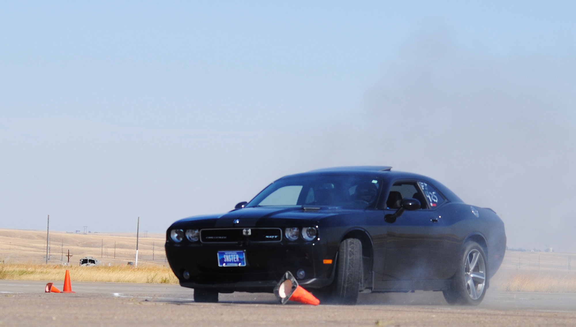 Michael Murray corrects his 2010 Dodge Challenger SRT8 through one of the many turns on the two-mile SCCA course set up on Malmstrom's flight line Sept. 25.  (U.S. Air Force photo/Airman Cortney Paxton)