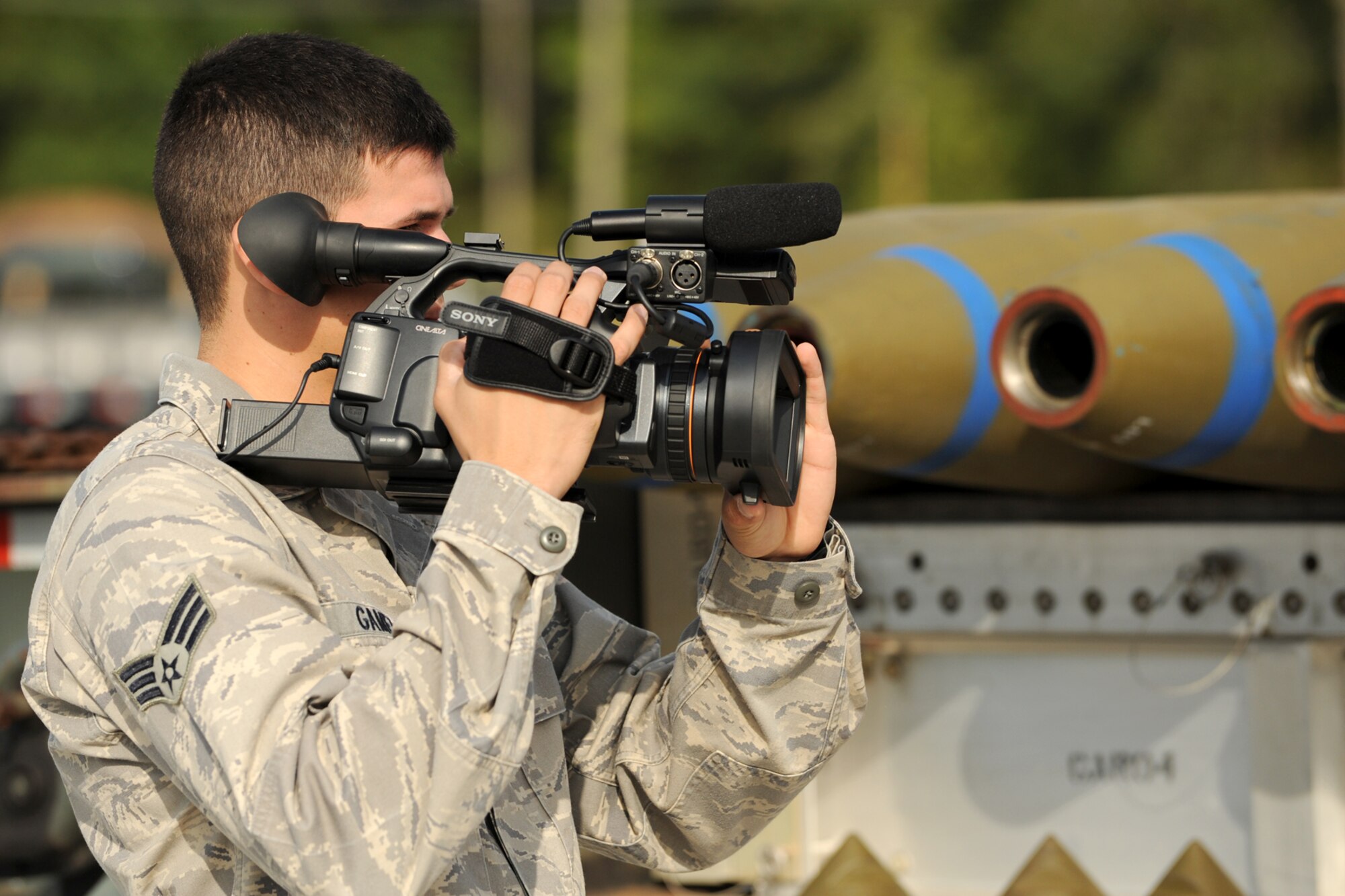 U.S. Air Force Senior Airman Anthony Gamez, 3rd Combat Camera Squadron (CCS) videographer, visits Barksdale Air Force Base, La., Sept. 30, 2011, to record video of 307th Bomb Wing personnel as they practice for the 2nd annual Global Strike Challenge, which is an Air Force bomber competition. The 3rd CCS is tasked to create video representations of each competing team, which will be shown during the competition's awards ceremony. (U.S. Air Force photo by Master Sgt. Greg Steele/Released)