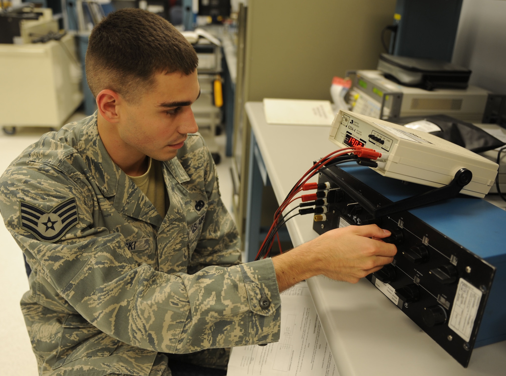 Staff Sgt. Richard Nowroski, 19th Component Maintenance Squadron precision measurement equipment laboratory quality manager, native to Mount Carmel, Penn., does a quality review on an ohmmeter, Sept. 19, 2011, at Little Rock Air Force Base, Ark. Norwroski has been attending college each semester for his degree in Social Science maintaining a 3.9 grade point average while also being very active in his squadron and flight fundraisers for charities, anchoring the squadron softball team, and volunteering for Meals on Wheels. (U.S. Air Force photo by Senior Airman Caleb Pierce)