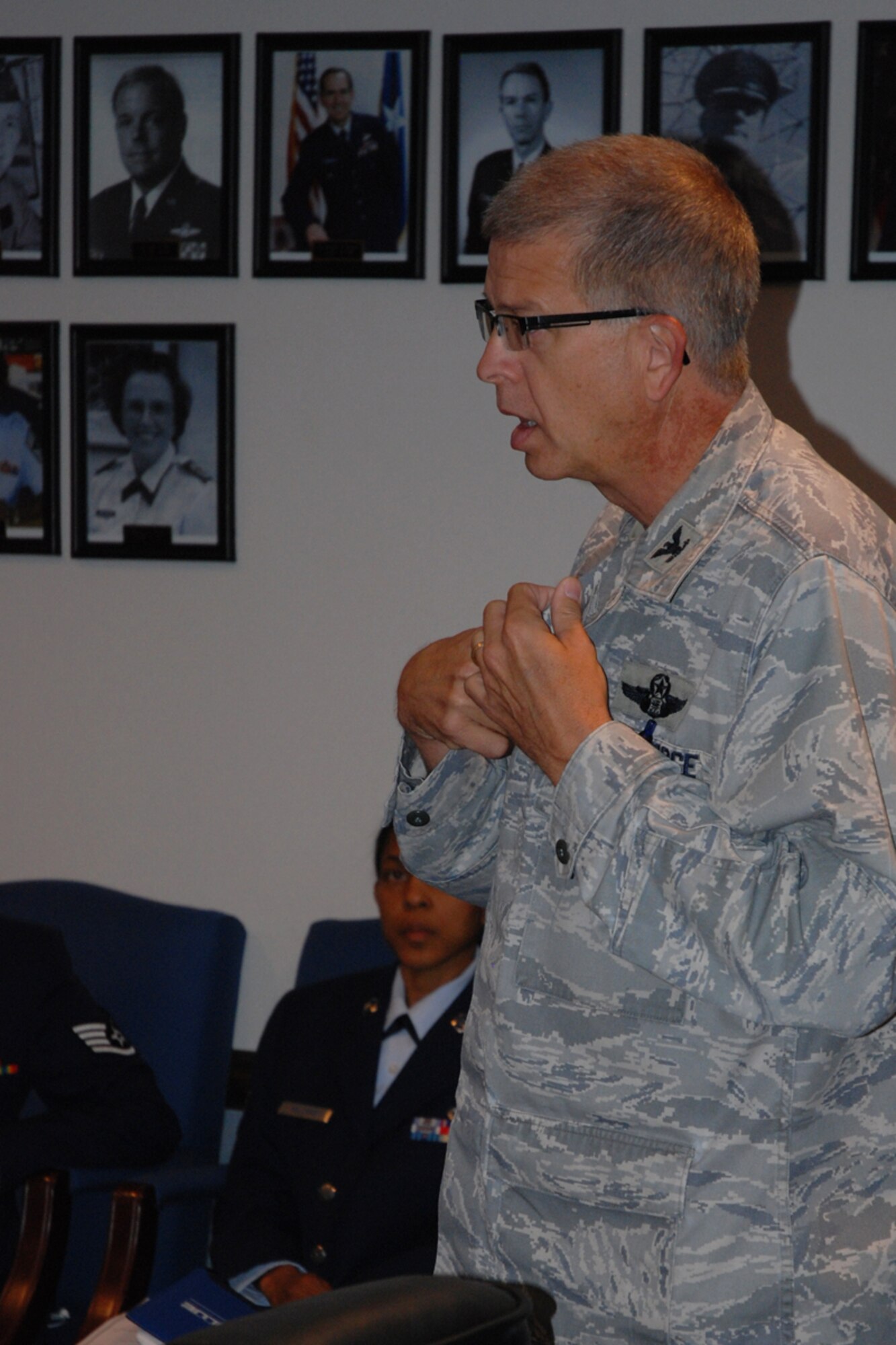 Col. Tim Tarchick, 94th Airlift Wing commander, speaks to wing members prior to a Class A uniform inspection, insuring each Airman was in regulation of Air Force Instruction 36-2903 on Uniform Dress and Appearance. Thirty-eight members of the 94th Airlift Wing were recently selected for a 4 day visit to Washington D.C. in Nov. “You have an opportunity to experience something that 99 percent of Americans will never do, “said Col. Tim Tarchick. “You will represent our wing and the United States Air Force well.” 