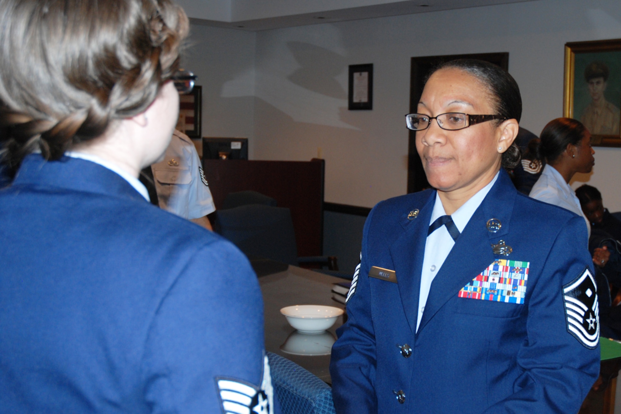 Master Sgt. Geambro L. Well, 94th Operations Support Squadron first sergeant, perfroms a Class A uniform inspection of 94th Airlift Wing members, insuring each Airman was in regulation of Air Force Instruction 36-2903 on Uniform Dress and Appearance. Thirty-eight members of the 94th Airlift Wing were recently selected for a 4 day visit to Washington D.C. in Nov. “You have an opportunity to experience something that 99 percent of Americans will never do, “said Col. Tim Tarchick. “You will represent our wing and the United States Air Force well.” 