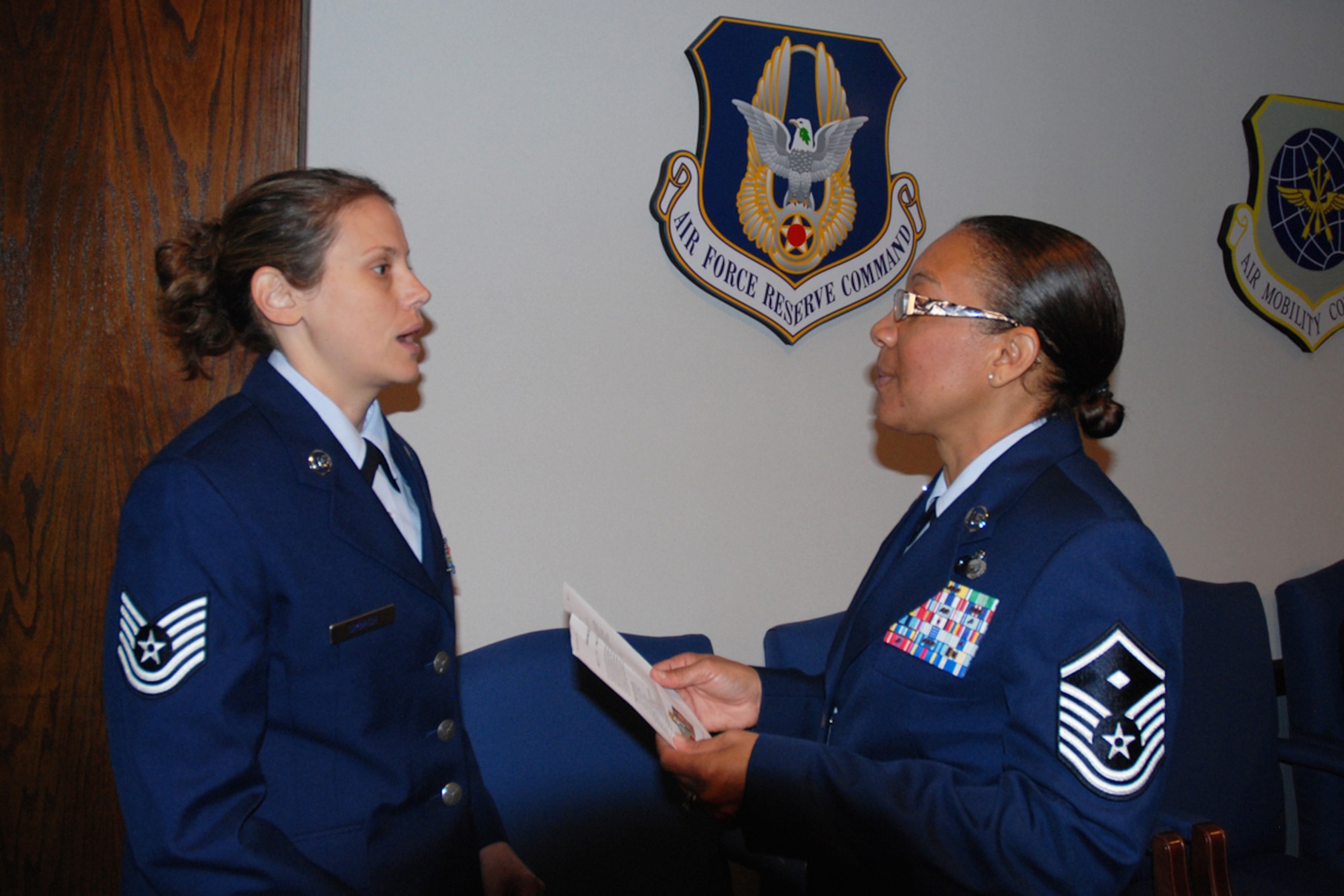 Master Sgt. Geambro L. Well, 94th Operations Support Squadron first sergeant, perfroms a Class A uniform inspection of 94th Airlift Wing members, insuring each Airman was in regulation of Air Force Instruction 36-2903 on Uniform Dress and Appearance. Thirty-eight members of the 94th Airlift Wing were recently selected for a 4 day visit to Washington D.C. in Nov. “You have an opportunity to experience something that 99 percent of Americans will never do, “said Col. Tim Tarchick. “You will represent our wing and the United States Air Force well.” 