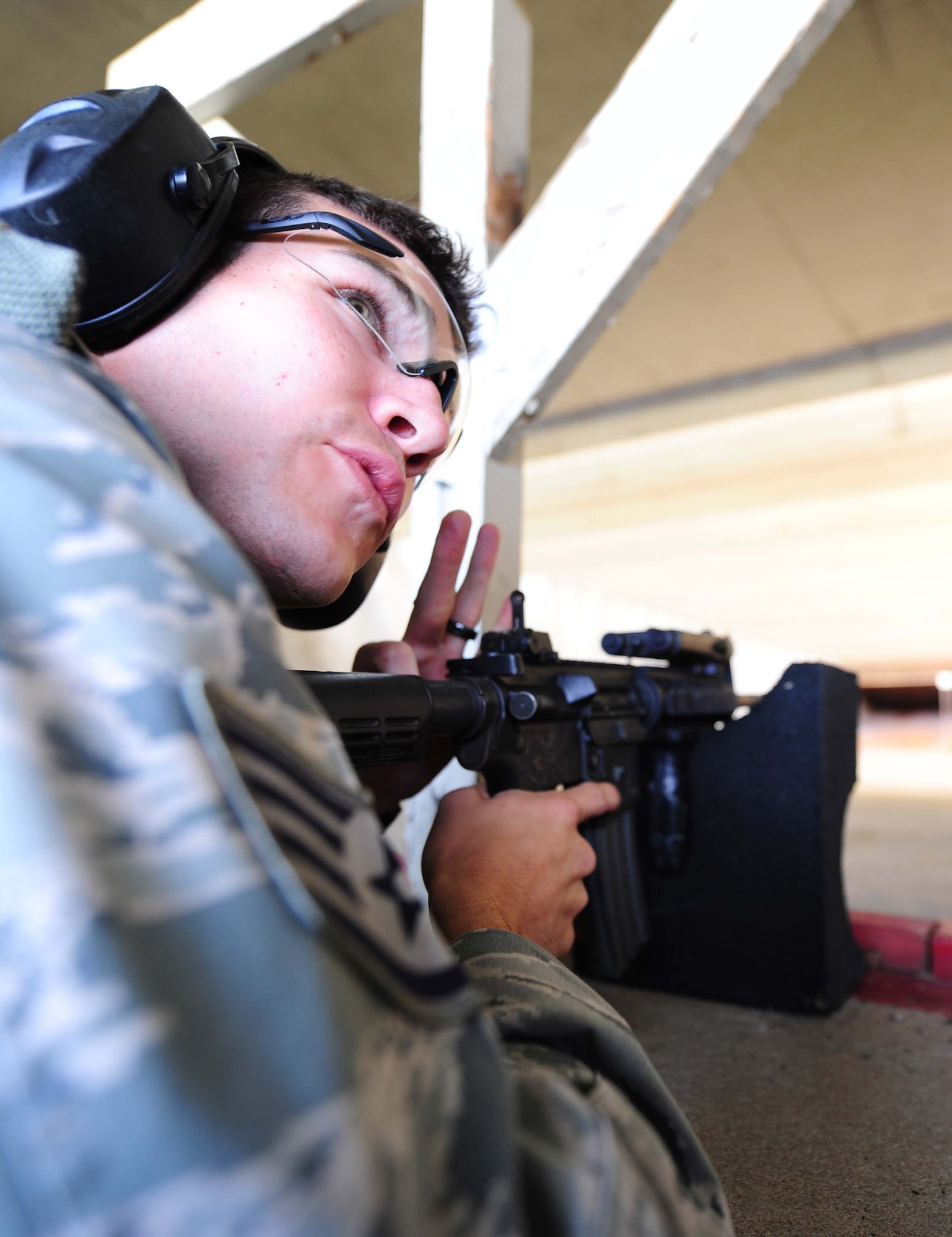 Staff Sgt. Kyle Douglass, 509th Security Forces Squadron, competes in the combat arms portion of the Air Force Global Strike Challenge try-outs here Sept. 21. Of those competing, seven will be chosen to represent Whiteman during the challenge. (U.S. Air Force photo/Senior Airman Nick Wilson) (RELEASED)