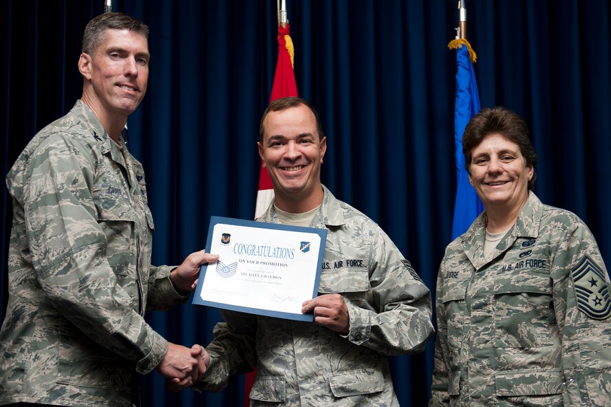 Michael Graydon, 39th Force Support Squadron, is promoted to the rank of technical sergeant Sept. 30, 2011, at the Club Complex ballroom at Incirlik Air Base, Turkey. (U.S. Air Force photo by Tech. Sgt. Michael B. Keller/Released)