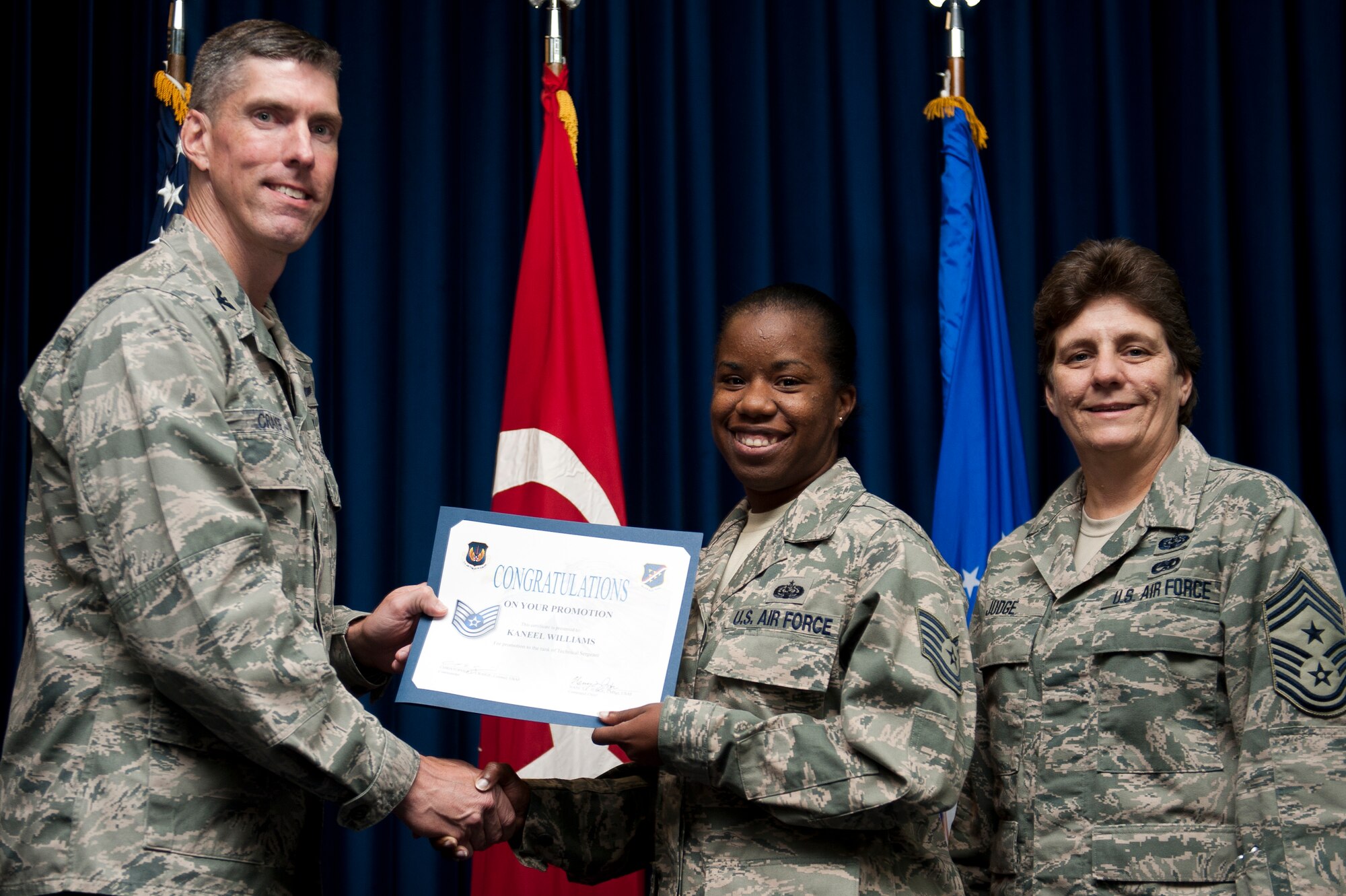 Kaneel Williams, 39th Communications Squadron, is promoted to the rank of technical sergeant Sept. 30, 2011, at the Club Complex ballroom at Incirlik Air Base, Turkey. (U.S. Air Force photo by Tech. Sgt. Michael B. Keller/Released)