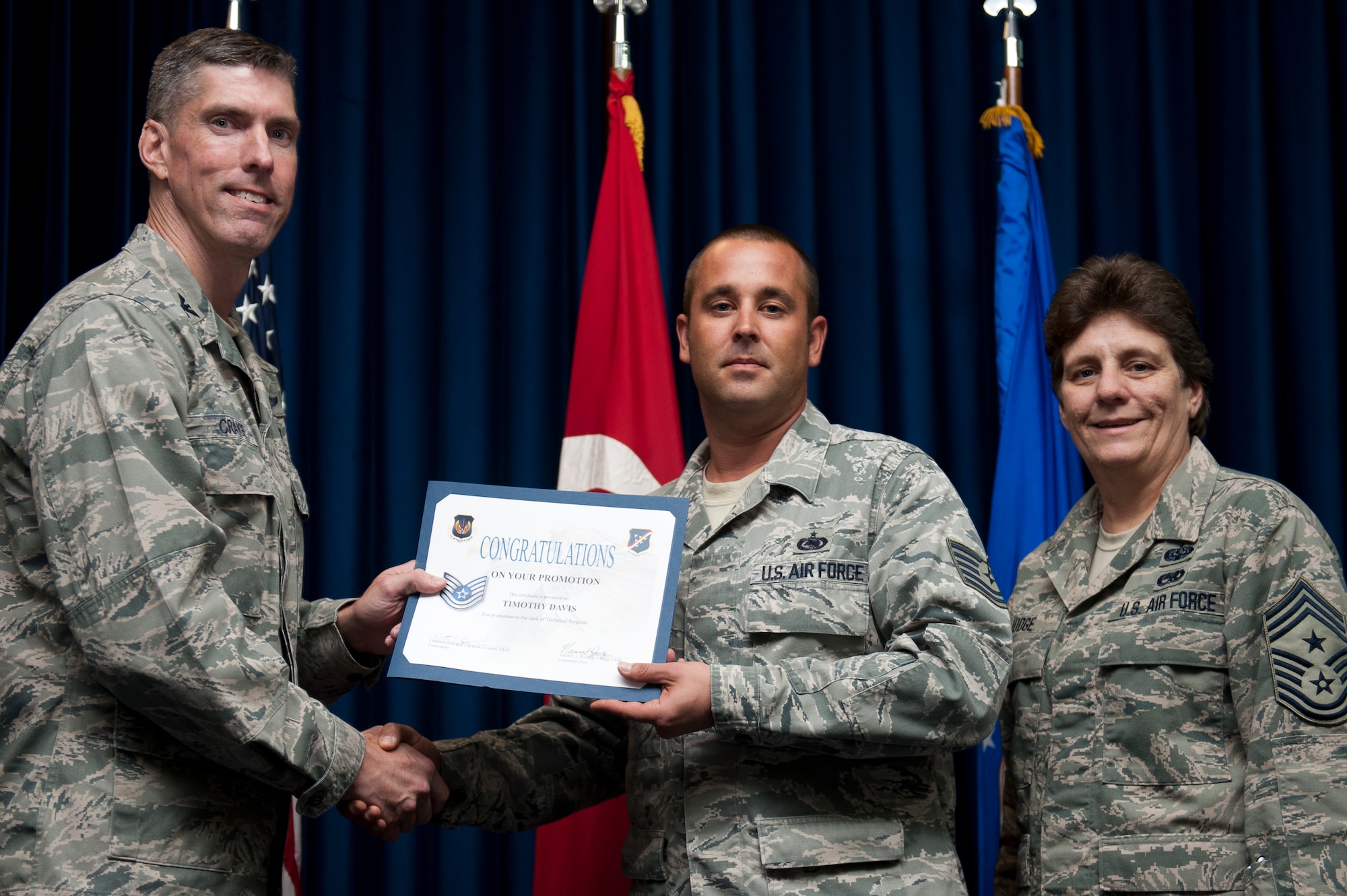 Timothy Davis, 39th Logistics Readiness Squadron, is promoted to the rank of technical sergeant Sept. 30, 2011, at the Club Complex ballroom at Incirlik Air Base, Turkey. (U.S. Air Force photo by Tech. Sgt. Michael B. Keller/Released)