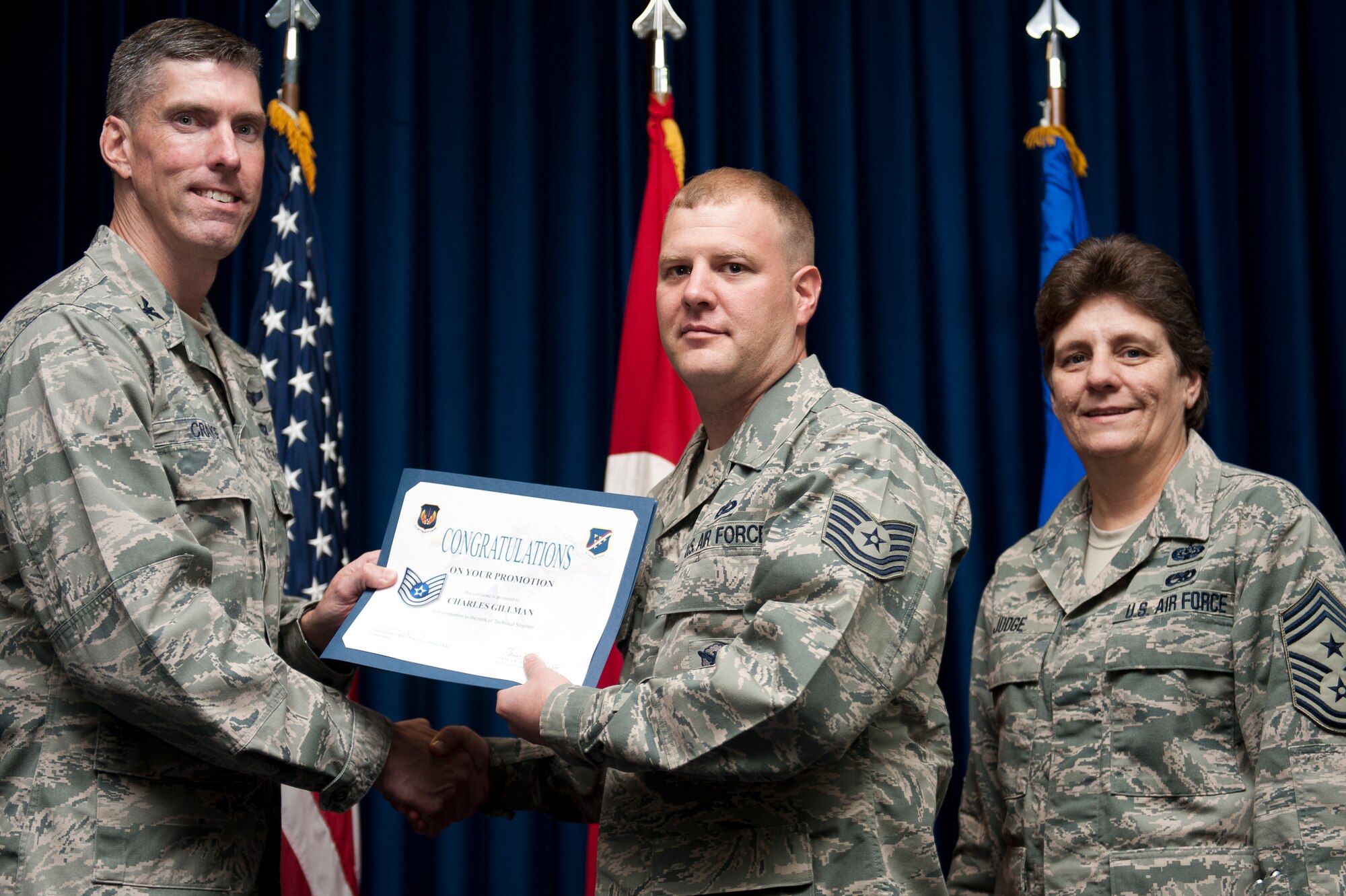 Charles Gillman, 39th Security Forces Squadron, is promoted to the rank of technical sergeant Sept. 30, 2011, at the Club Complex ballroom at Incirlik Air Base, Turkey. (U.S. Air Force photo by Tech. Sgt. Michael B. Keller/Released)