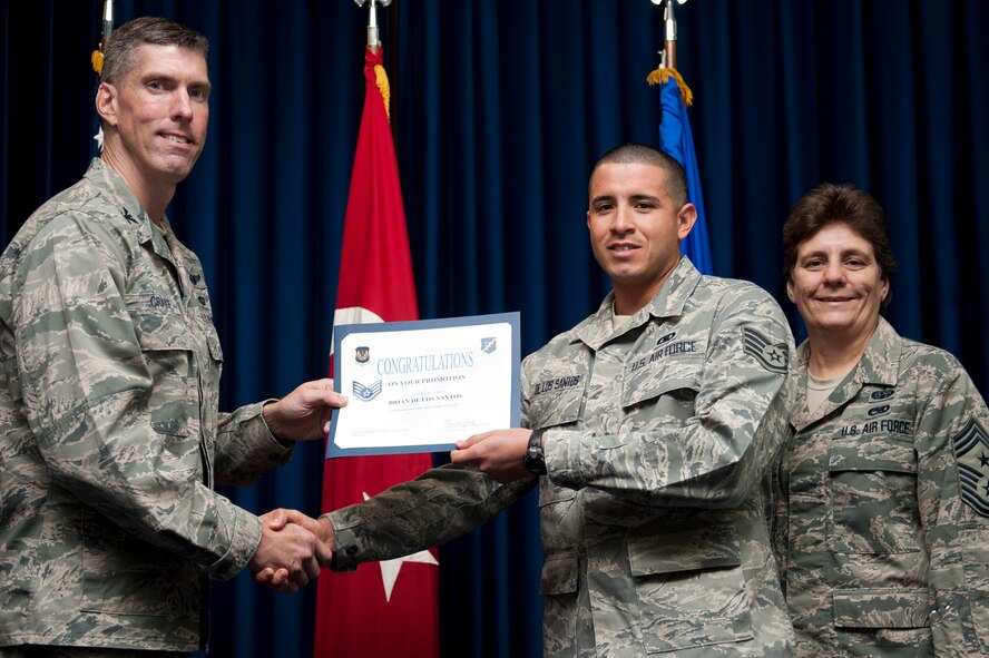 Brian De Los Santos, 39th Operations Squadron, is promoted to the rank of staff sergeant Sept. 30, 2011, at the Club Complex ballroom at Incirlik Air Base, Turkey. (U.S. Air Force photo by Tech. Sgt. Michael B. Keller/Released)