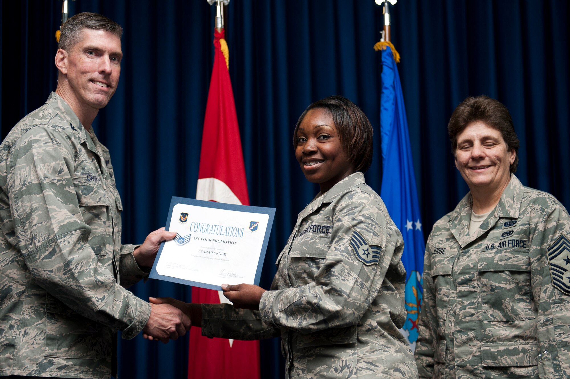 Teara Turner, 39th Medical Operations Squadron, is promoted to the rank of staff sergeant Sept. 30, 2011, at the Club Complex ballroom at Incirlik Air Base, Turkey. (U.S. Air Force photo by Tech. Sgt. Michael B. Keller/Released)