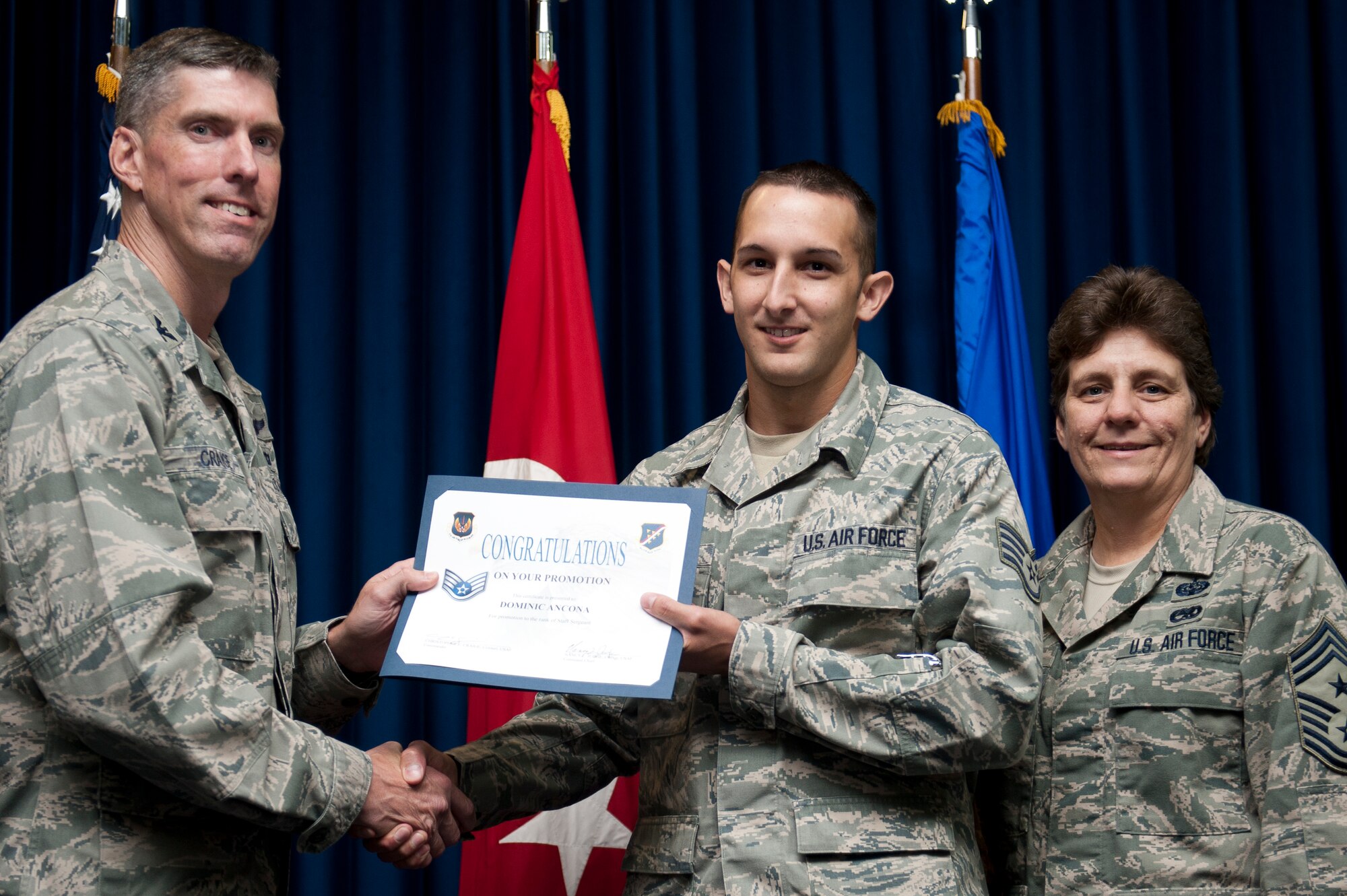Dominic Ancona, 39th Medical Operations Squadron, is promoted to the rank of staff sergeant Sept. 30, 2011, at the Club Complex ballroom at Incirlik Air Base, Turkey. (U.S. Air Force photo by Tech. Sgt. Michael B. Keller/Released)