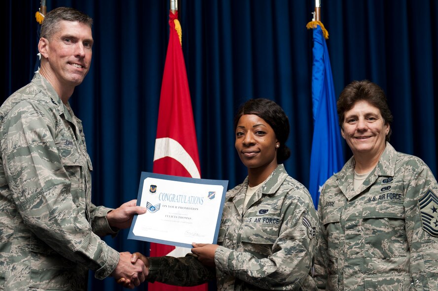 Felicia Thomas, 39th Logistics Readiness Squadron, is promoted to the rank of staff sergeant Sept. 30, 2011, at the Club Complex ballroom at Incirlik Air Base, Turkey. (U.S. Air Force photo by Tech. Sgt. Michael B. Keller/Released)